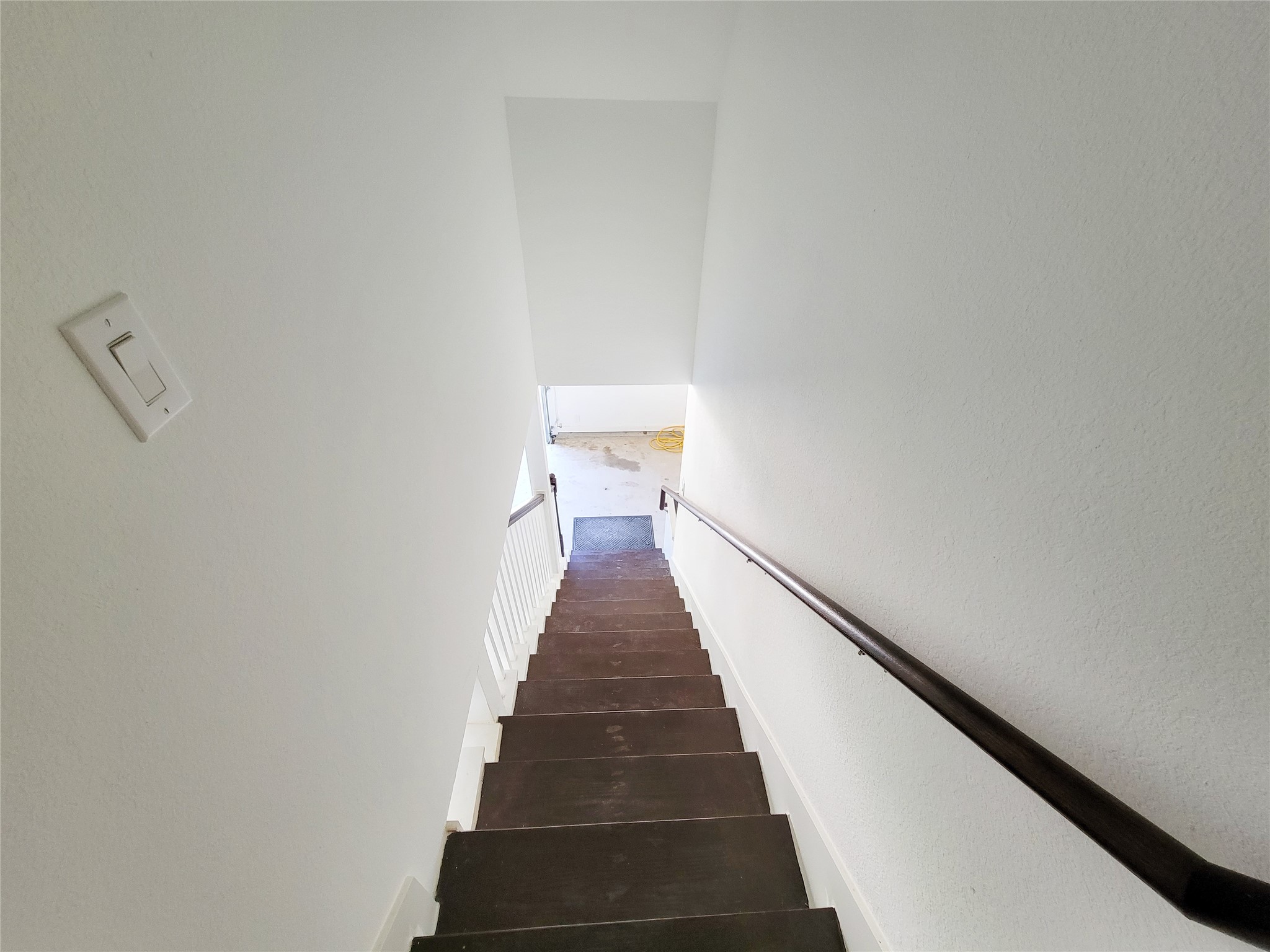 4937 Wolff Road Round Top, TX 78954 - Photo 21 of 31 Private stairway from the garage leads to an upstairs bedroom and sitting area.