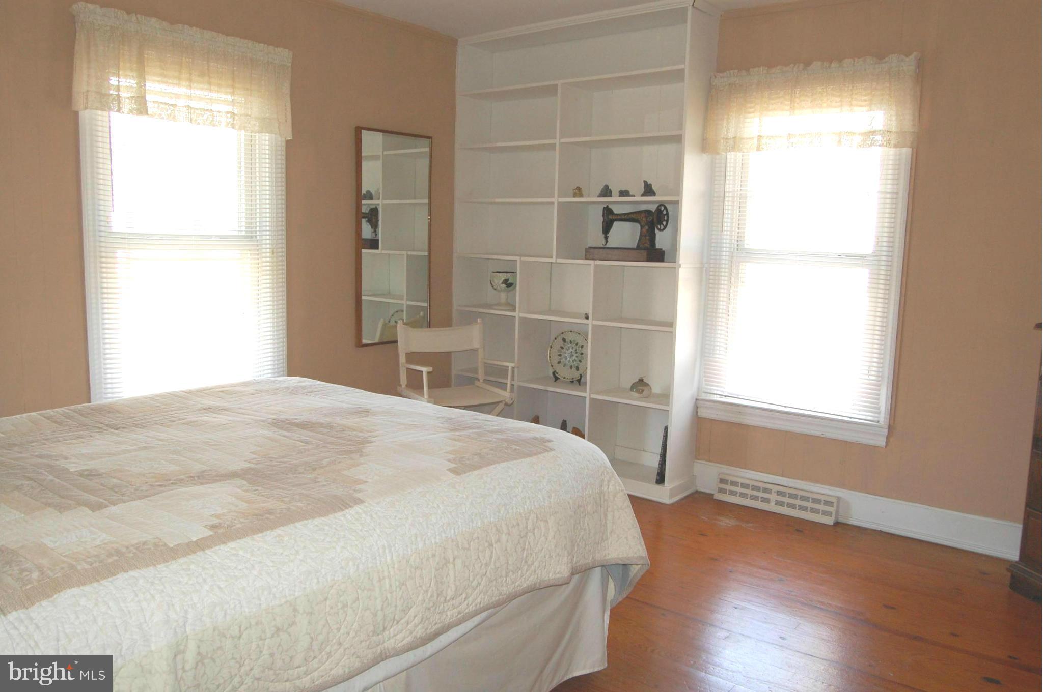 5936 Horns Point Road Cambridge, MD 21613 - Photo 11 of 30 Bedroom #2-1st floor w/built-in bookcase