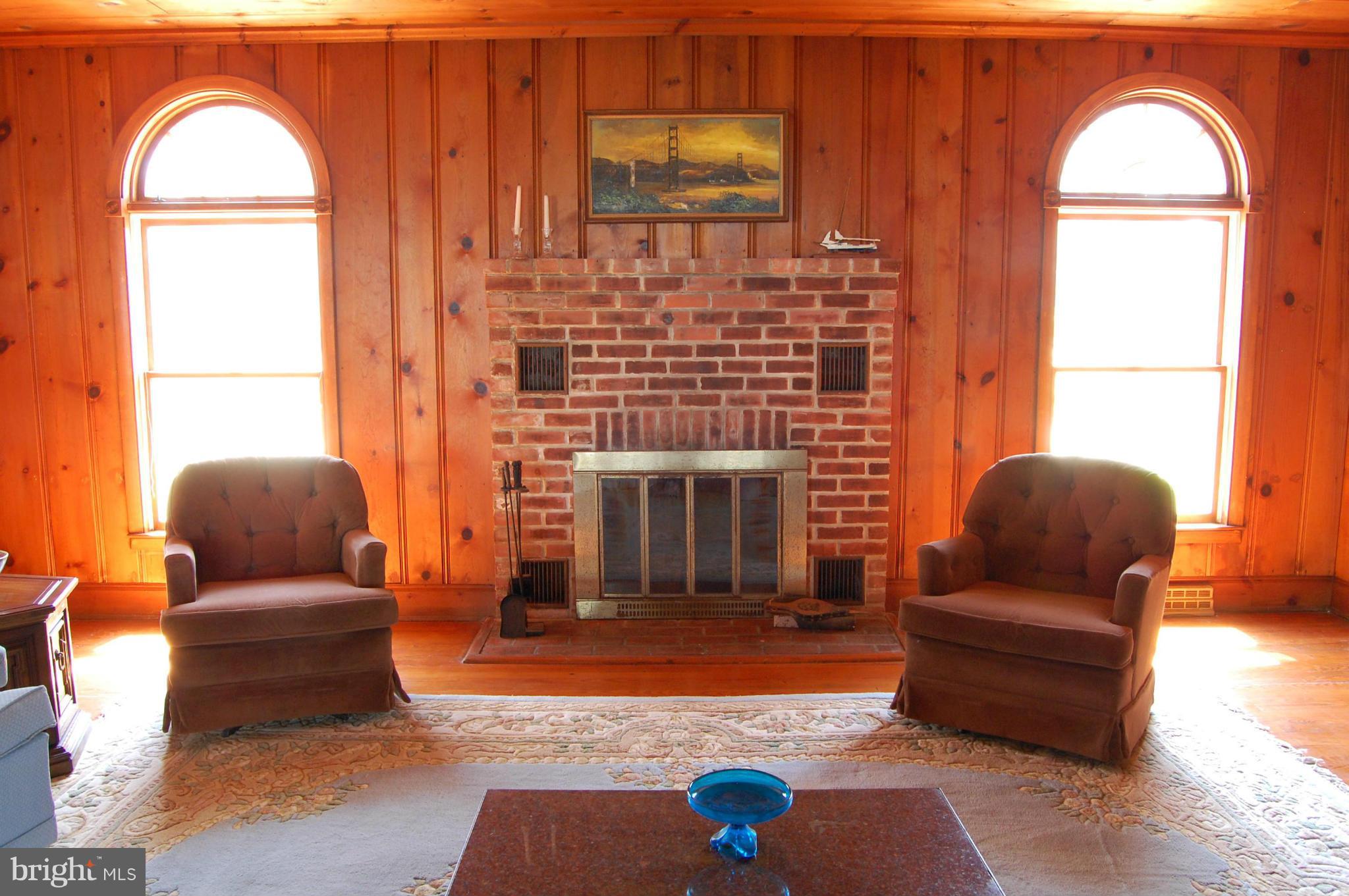 5936 Horns Point Road Cambridge, MD 21613 - Photo 5 of 30 Family Room with knotty pine walls & ceiling