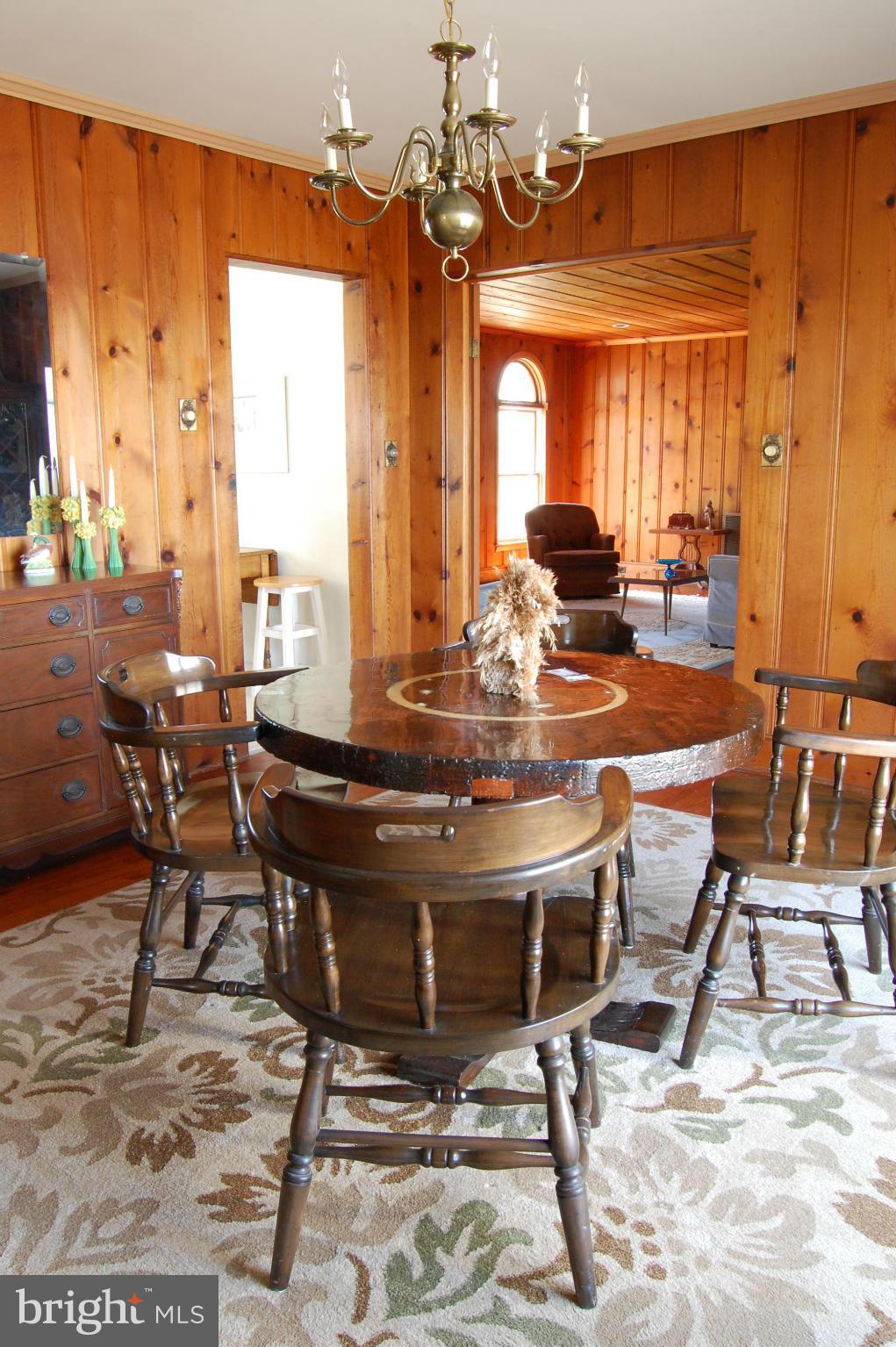 5936 Horns Point Road Cambridge, MD 21613 - Photo 6 of 30 Dining Room with knotty pine walls