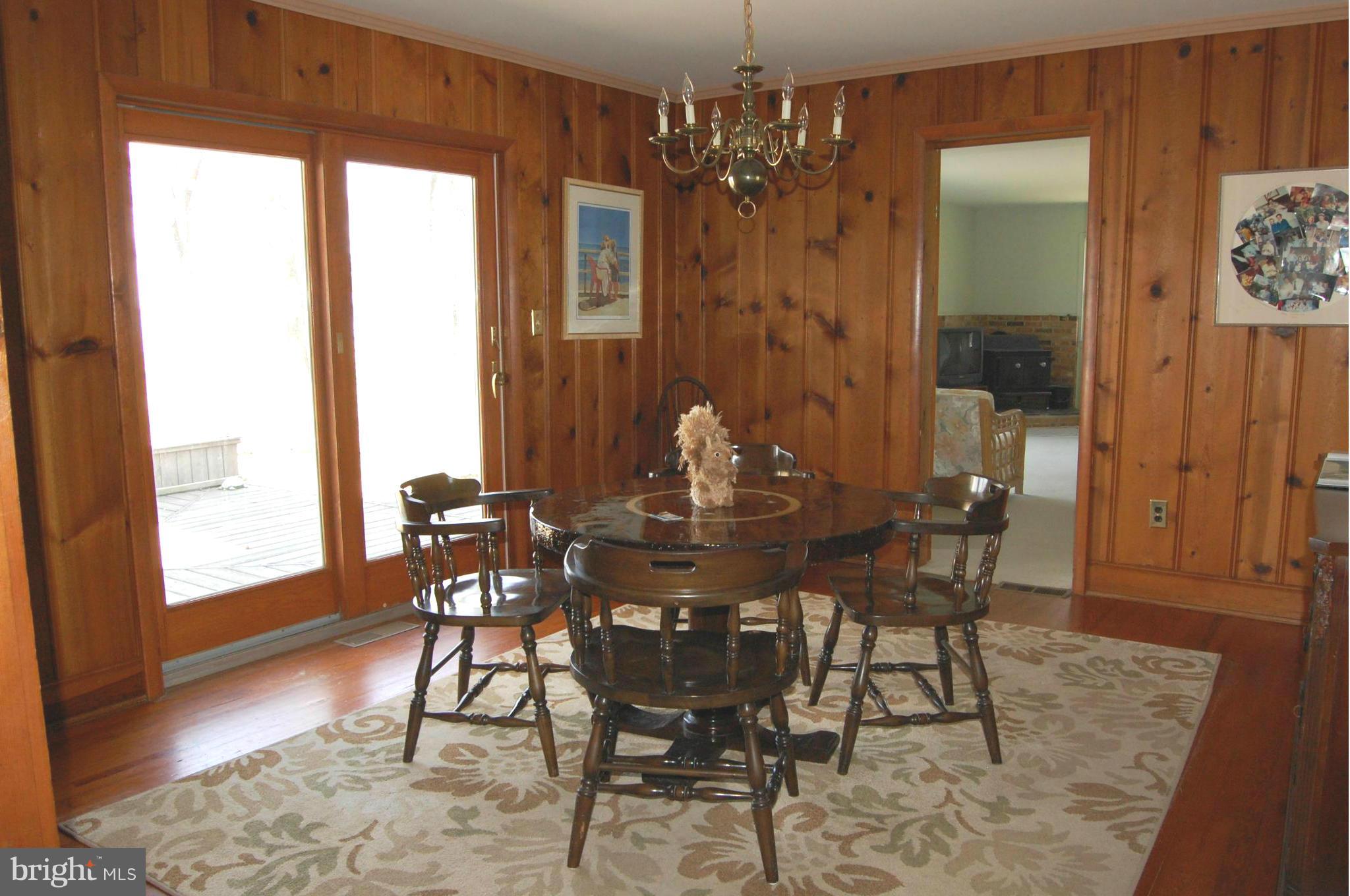 5936 Horns Point Road Cambridge, MD 21613 - Photo 7 of 30 Dining Room w/sliders to deck