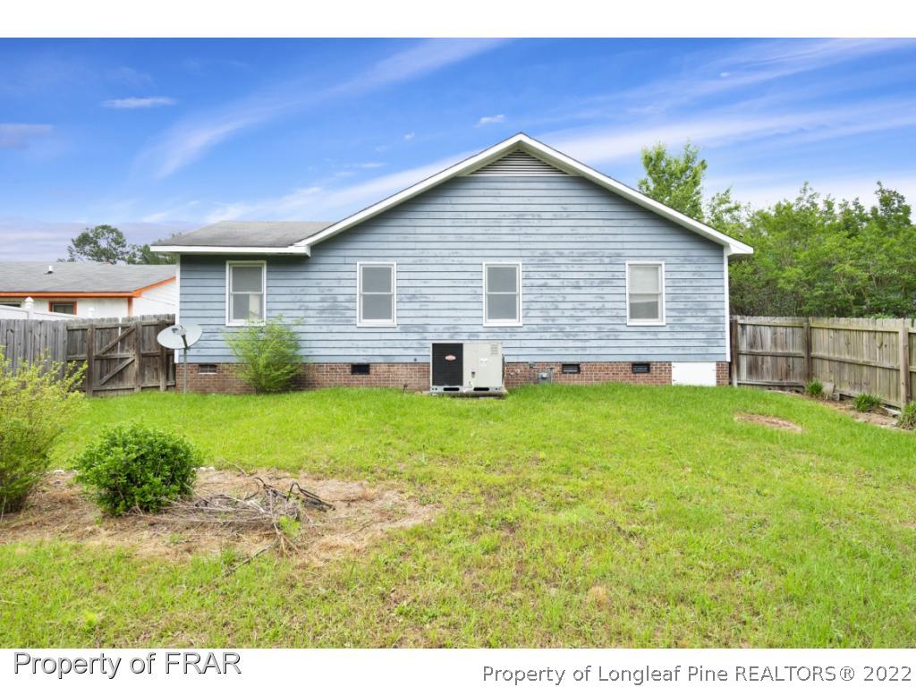 6549 Rhemish Drive Fayetteville, NC 28304 - Photo 2 of 27 a view of outdoor space yard and yard