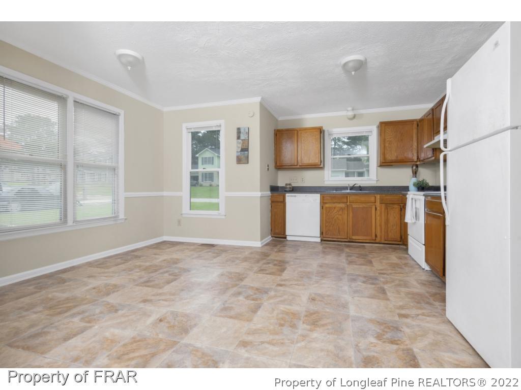 6549 Rhemish Drive Fayetteville, NC 28304 - Photo 10 of 27 a view interior of kitchen and kitchen