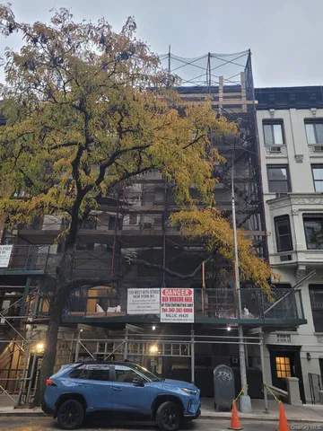 a car parked in front of a building