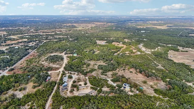 an aerial view of residential building and green space