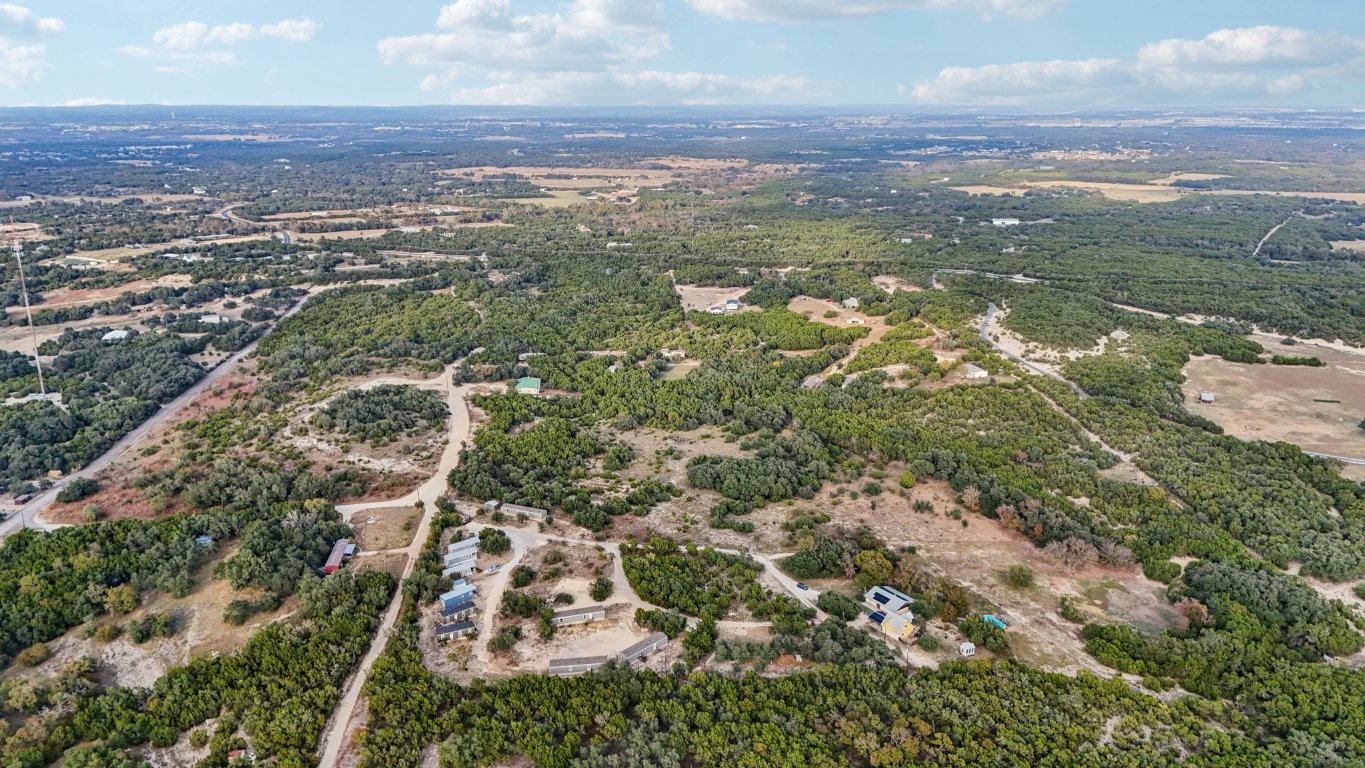 24369-2 Bingham Creek Road, Unit 8 Leander, TX 78641 - Photo 15 of 16 an aerial view of residential building and green space