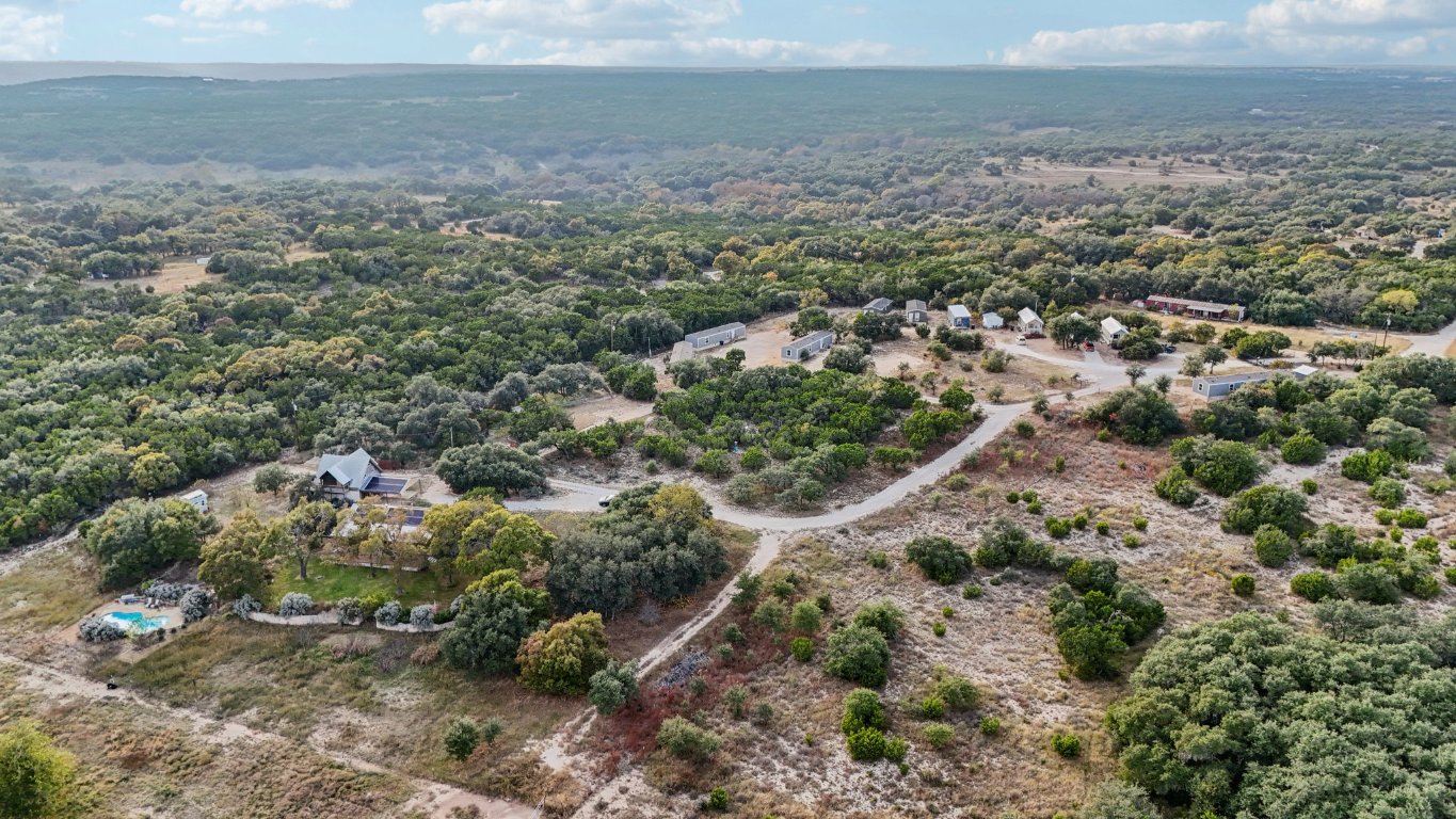 24369-2 Bingham Creek Road, Unit 8 Leander, TX 78641 - Photo 3 of 16 a view of a big yard with lots of green space