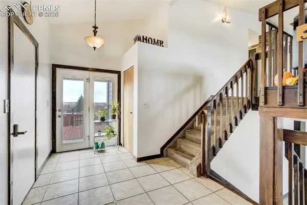a view of an entryway with staircase