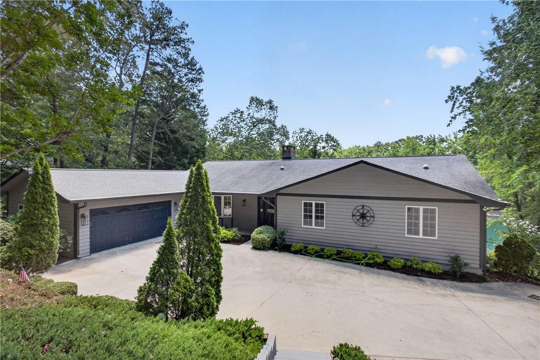 9 Lookout Lane Salem, SC 29676 - Photo 1 of 46 A welcoming driveway leads to this charming ranch-style home, nestled amidst mature trees for privacy.
