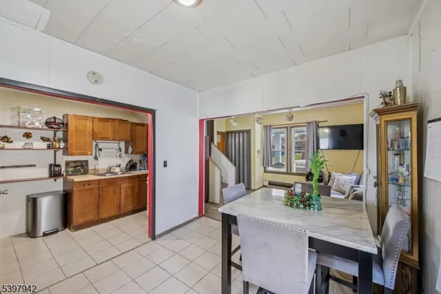 a kitchen with stainless steel appliances granite countertop a sink and a stove