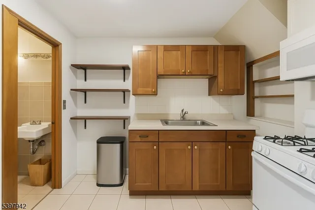 a view of a dining room with furniture and a livingroom