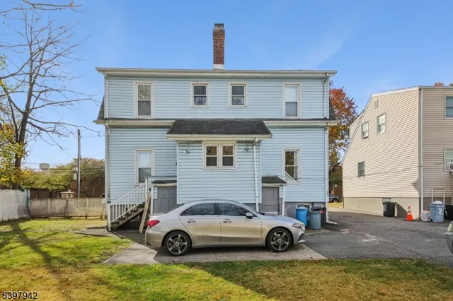 a view of yard with car parked