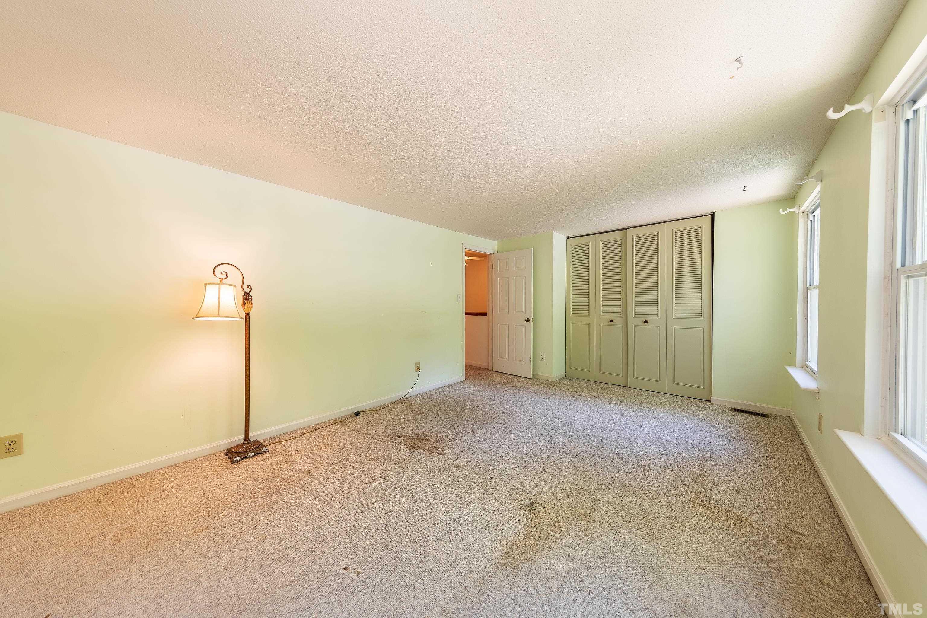 7328 Summerland Drive Raleigh, NC 27612 - Photo 16 of 22 a view of a room with an empty room