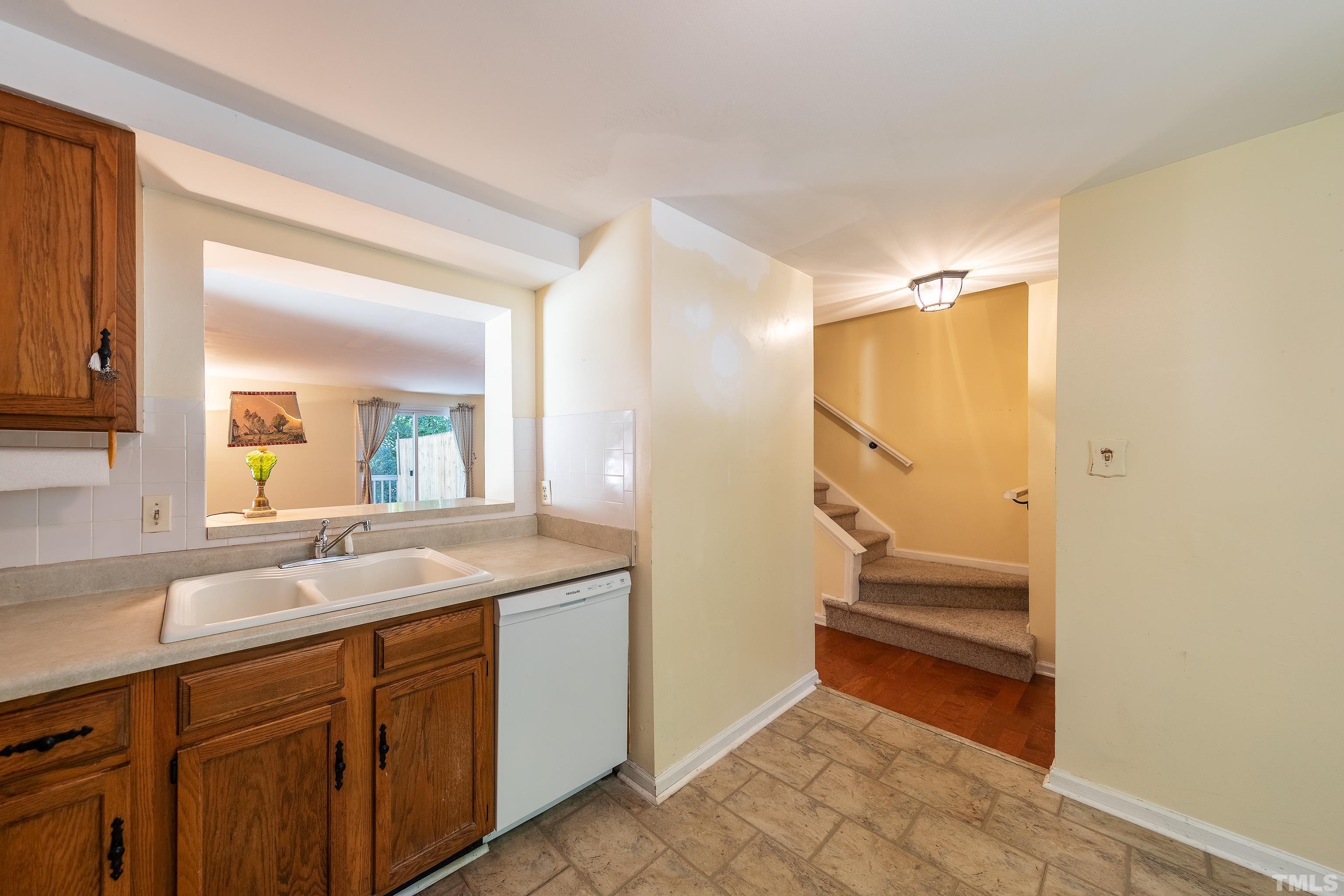 7328 Summerland Drive Raleigh, NC 27612 - Photo 6 of 22 a bathroom with a sink and a mirror
