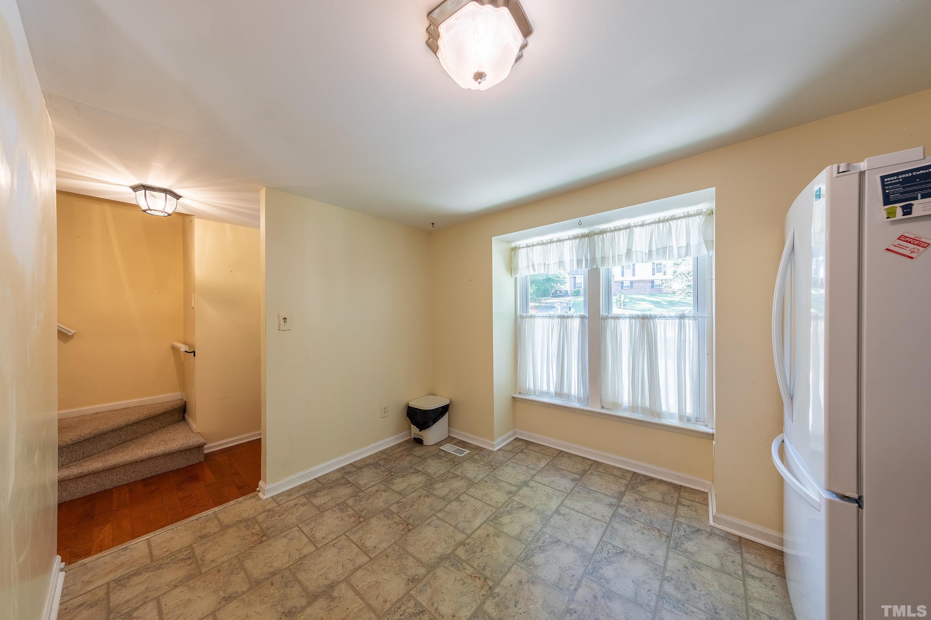 7328 Summerland Drive Raleigh, NC 27612 - Photo 7 of 22 a view of empty room with window