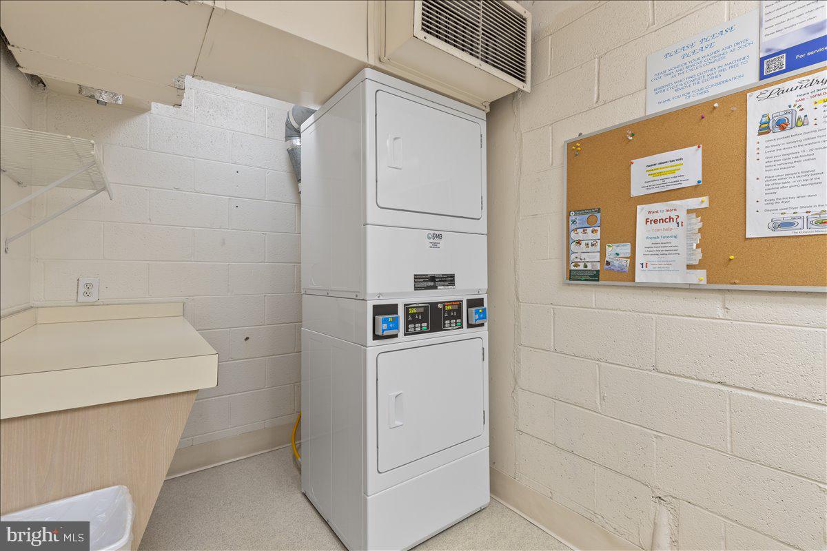 5101 River Road, Unit 1506 Bethesda, MD 20816 - Photo 30 of 37 a bathroom with a sink a toilet and shower