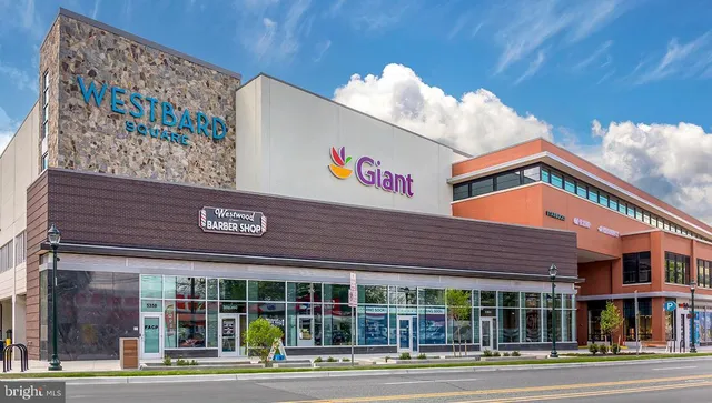 a group of people walking down a street