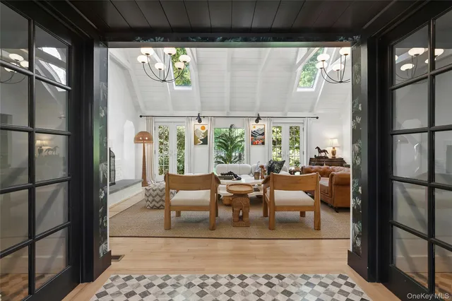 a view of a living room with a large window