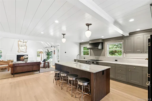 a kitchen with cabinets a sink and a stove