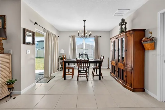 a dining room well furnished