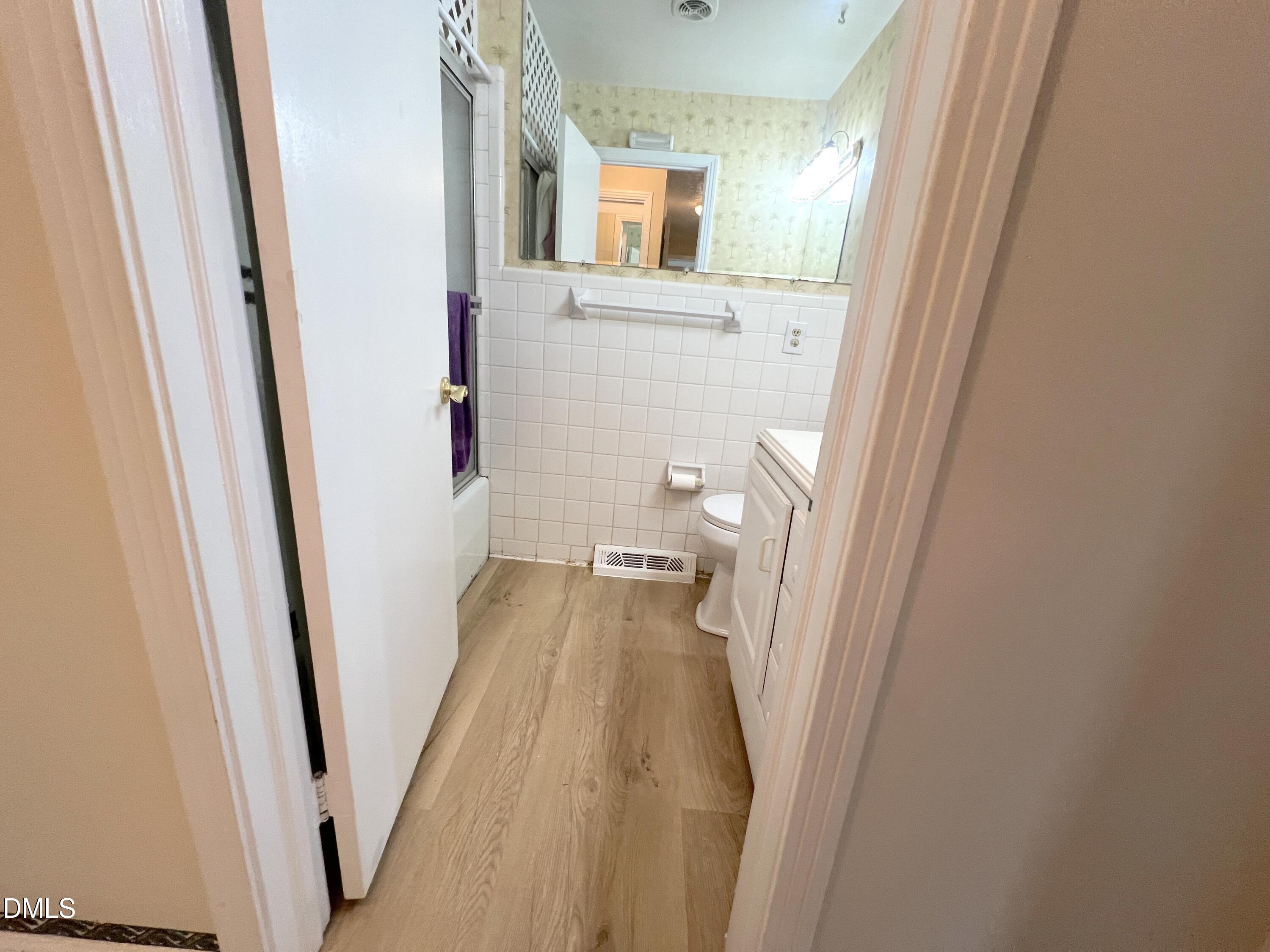 66 Allensville Road Roxboro, NC 27573 - Photo 17 of 52 a view of a bathroom from a hallway