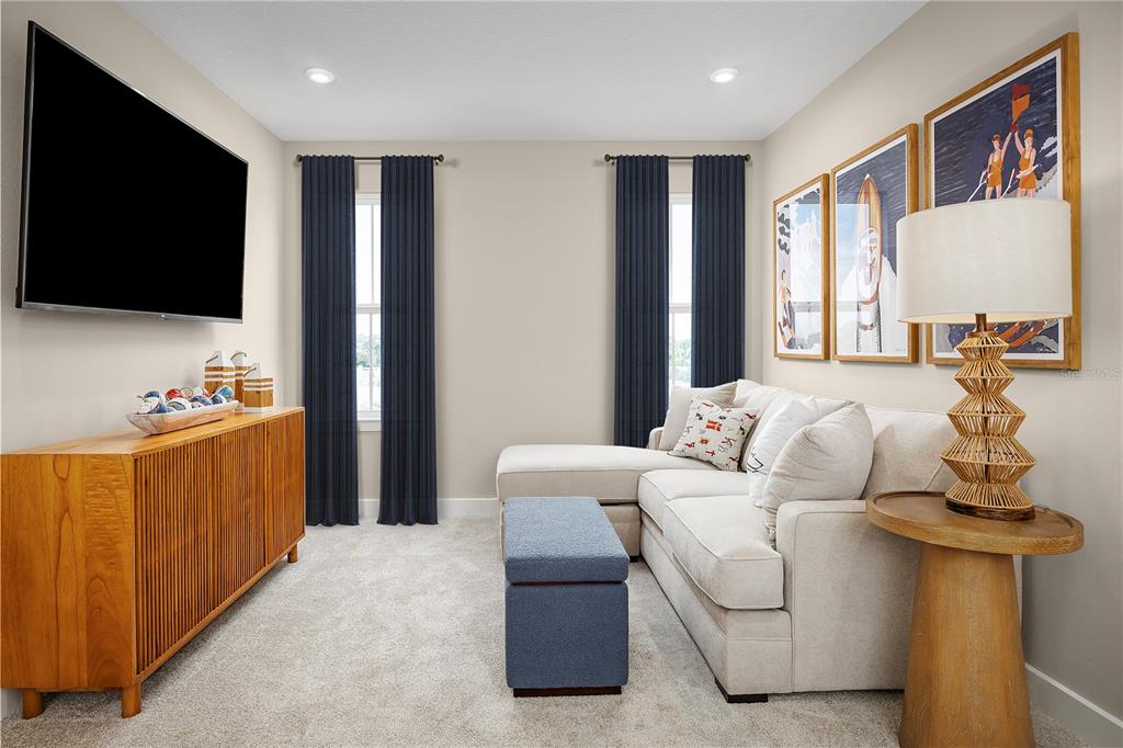 562 Creedmore Lane DeBary, FL 32713 - Photo 10 of 17 a living room with furniture and a flat screen tv