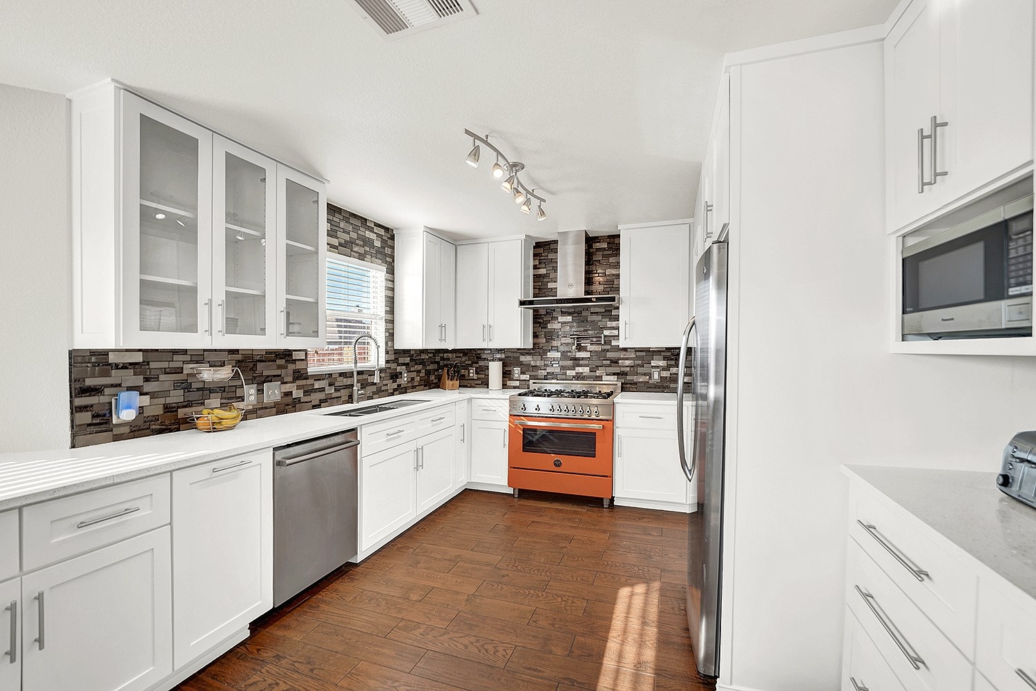 113 Endeavour Kyle, TX 78640 - Photo 13 of 38 Kitchen with vent hood and pot filler
