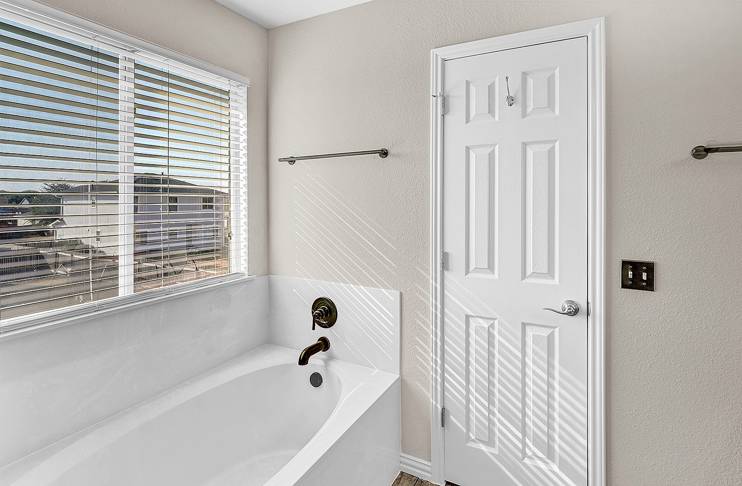 113 Endeavour Kyle, TX 78640 - Photo 22 of 38 Primary ensuite with soaking tub and door to walk-in closet