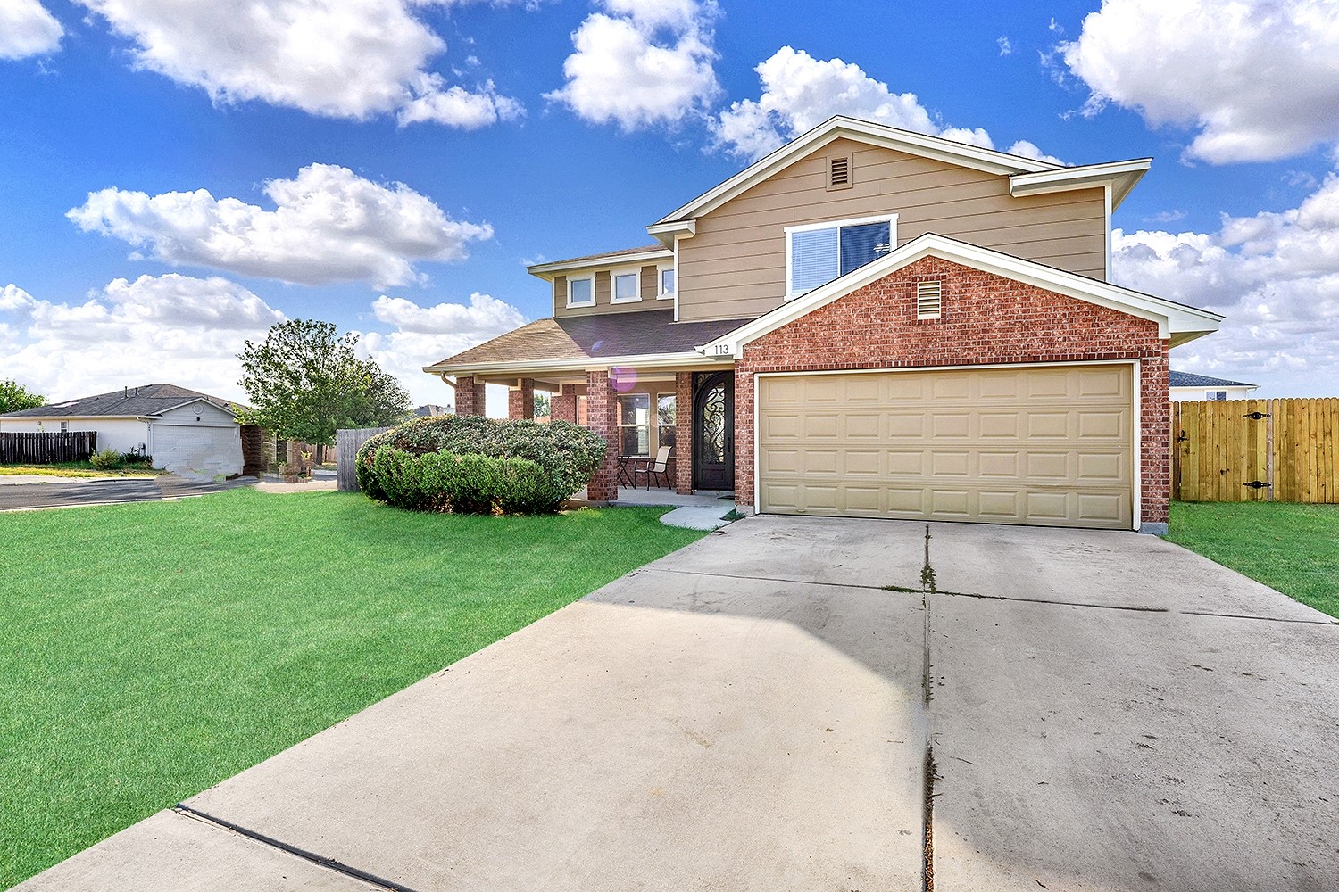 113 Endeavour Kyle, TX 78640 - Photo 37 of 38 Deep driveway and grass color enhanced