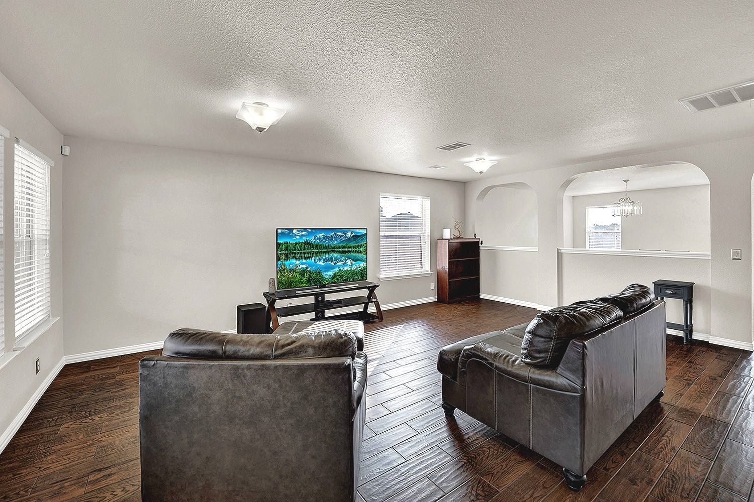 113 Endeavour Kyle, TX 78640 - Photo 6 of 38 Living room with opening to dining area
