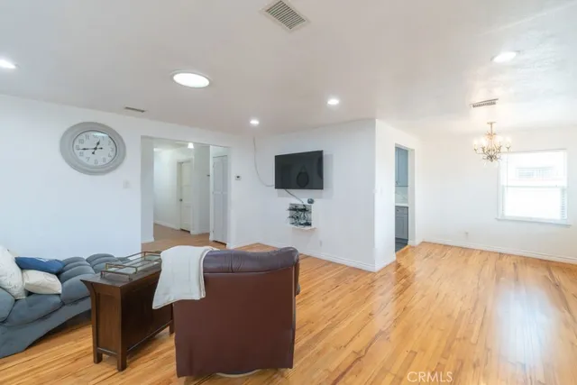 a living room with a couch and a flat screen tv