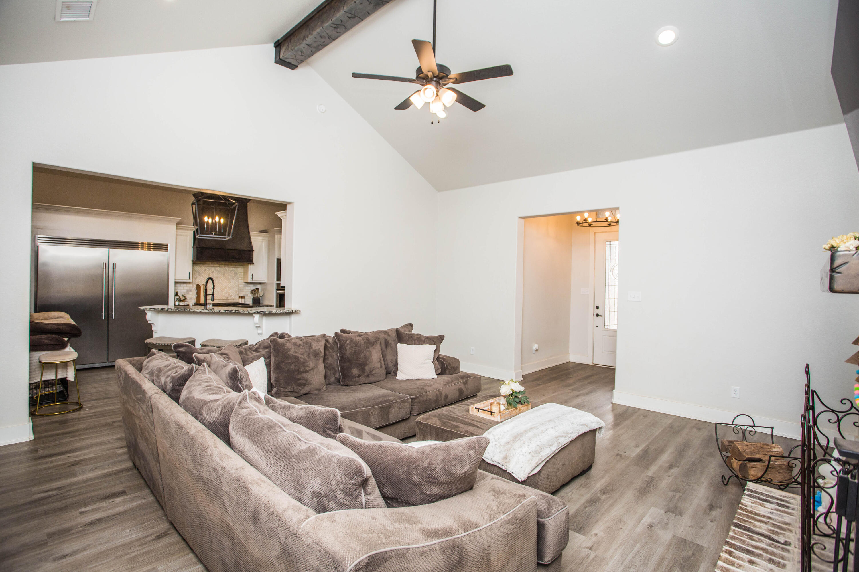 2204 County Road 7815 Lubbock, TX 79423 - Photo 15 of 58 a living room with furniture and a wooden floor