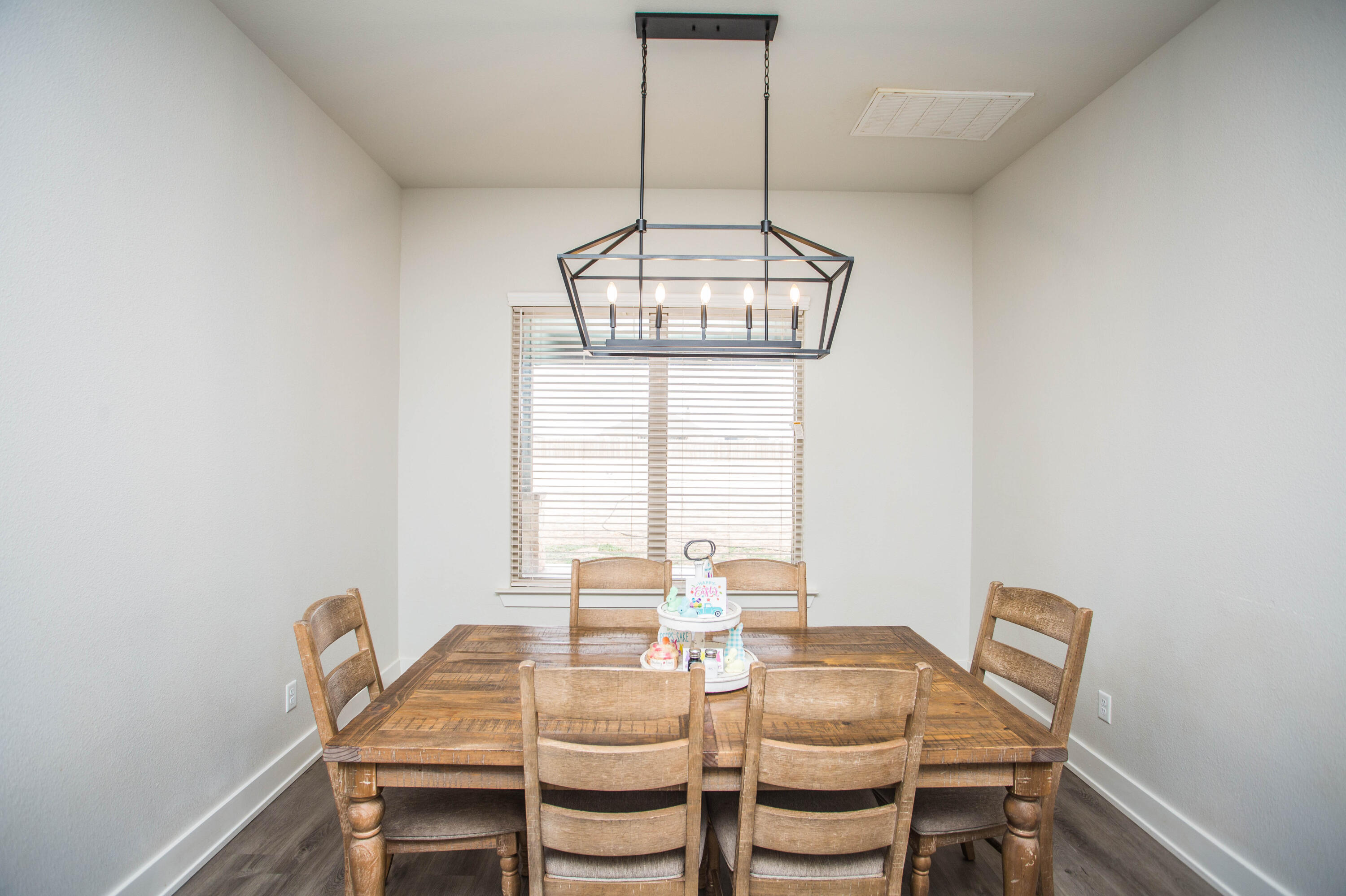 2204 County Road 7815 Lubbock, TX 79423 - Photo 23 of 58 a dining room with furniture and window