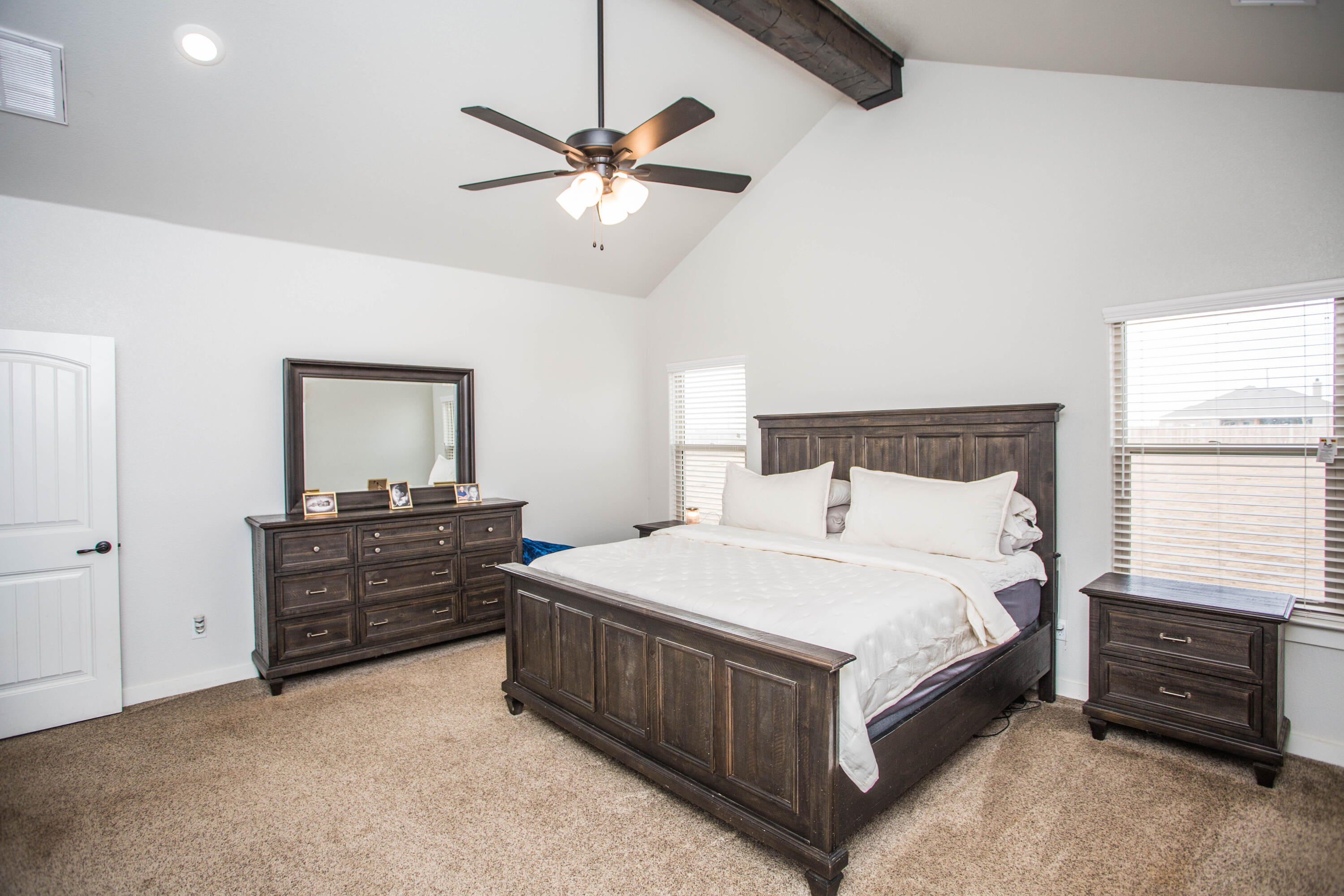 2204 County Road 7815 Lubbock, TX 79423 - Photo 30 of 58 a bedroom with a bed and window