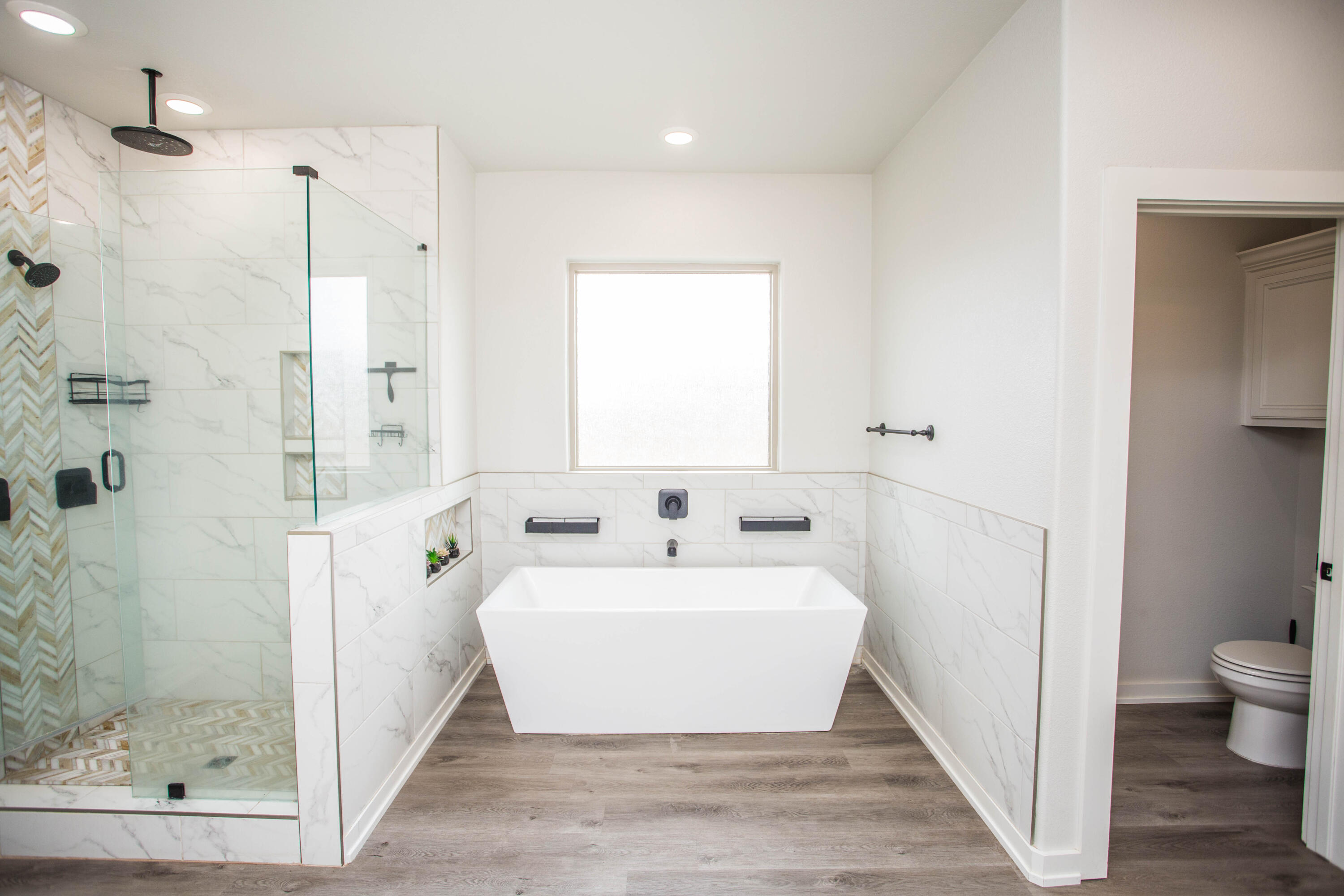 2204 County Road 7815 Lubbock, TX 79423 - Photo 33 of 58 a bathroom with a sink and a mirror