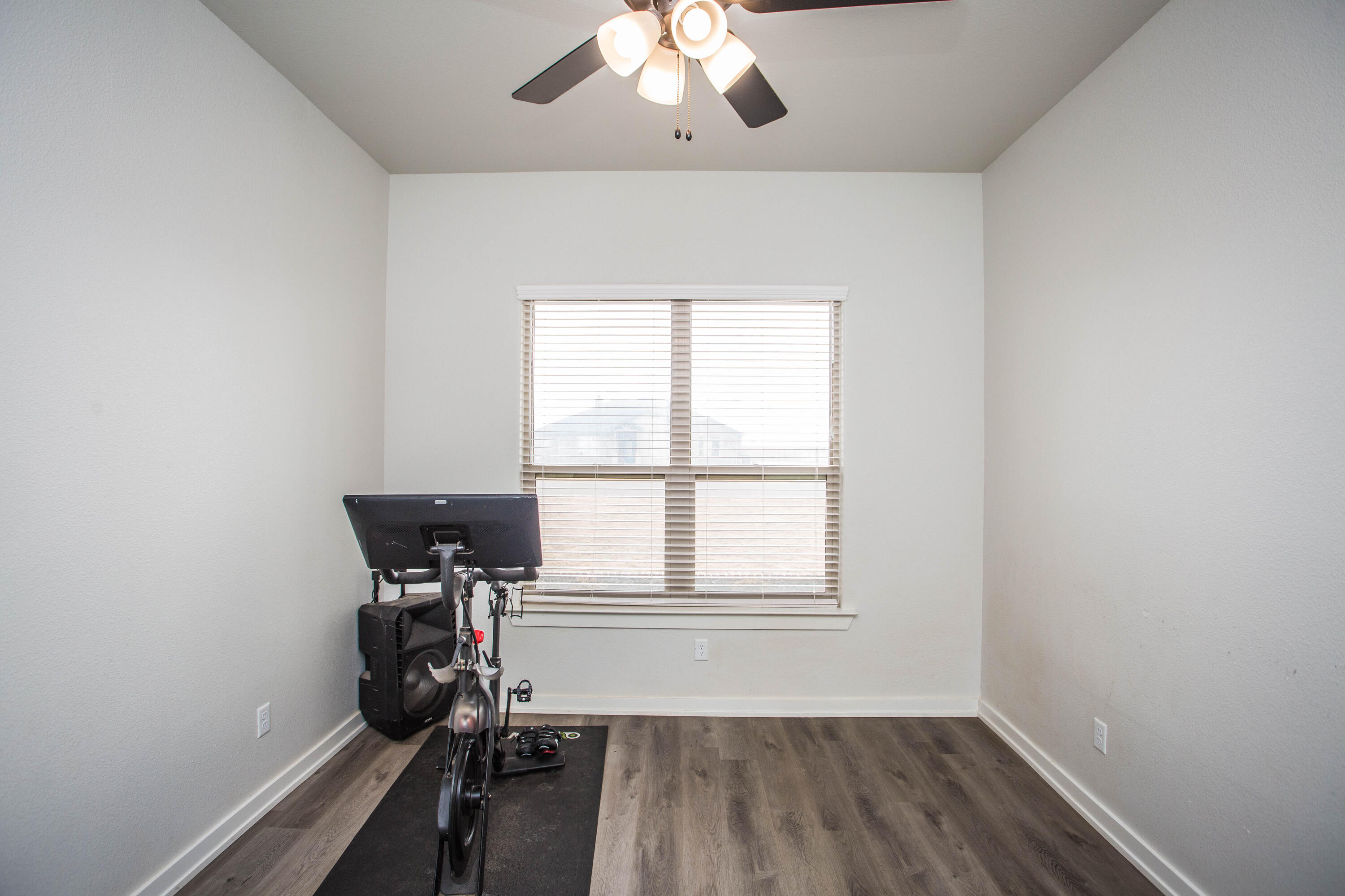 2204 County Road 7815 Lubbock, TX 79423 - Photo 38 of 58 an empty room with a window