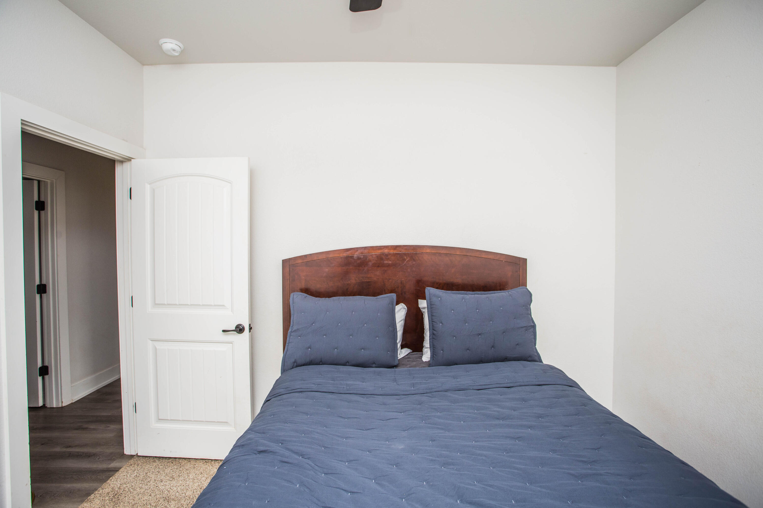 2204 County Road 7815 Lubbock, TX 79423 - Photo 47 of 58 a room with a wooden floor