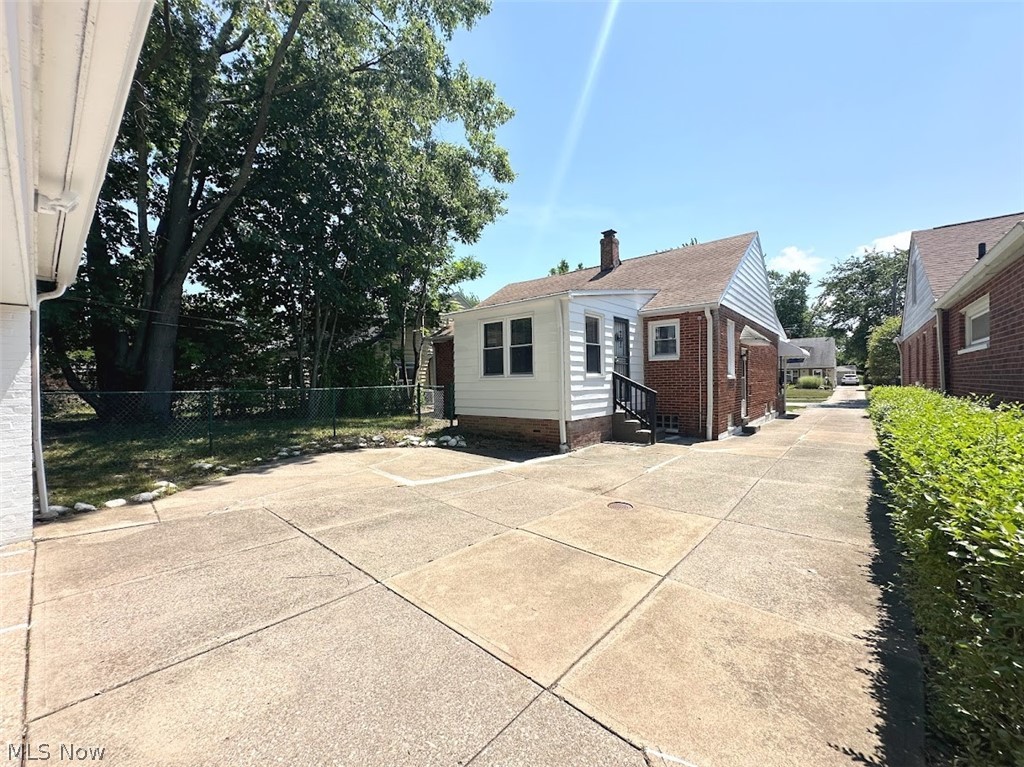 4227 Eastway Road South Euclid, OH 44121 - Photo 18 of 18 Back of property featuring a patio area