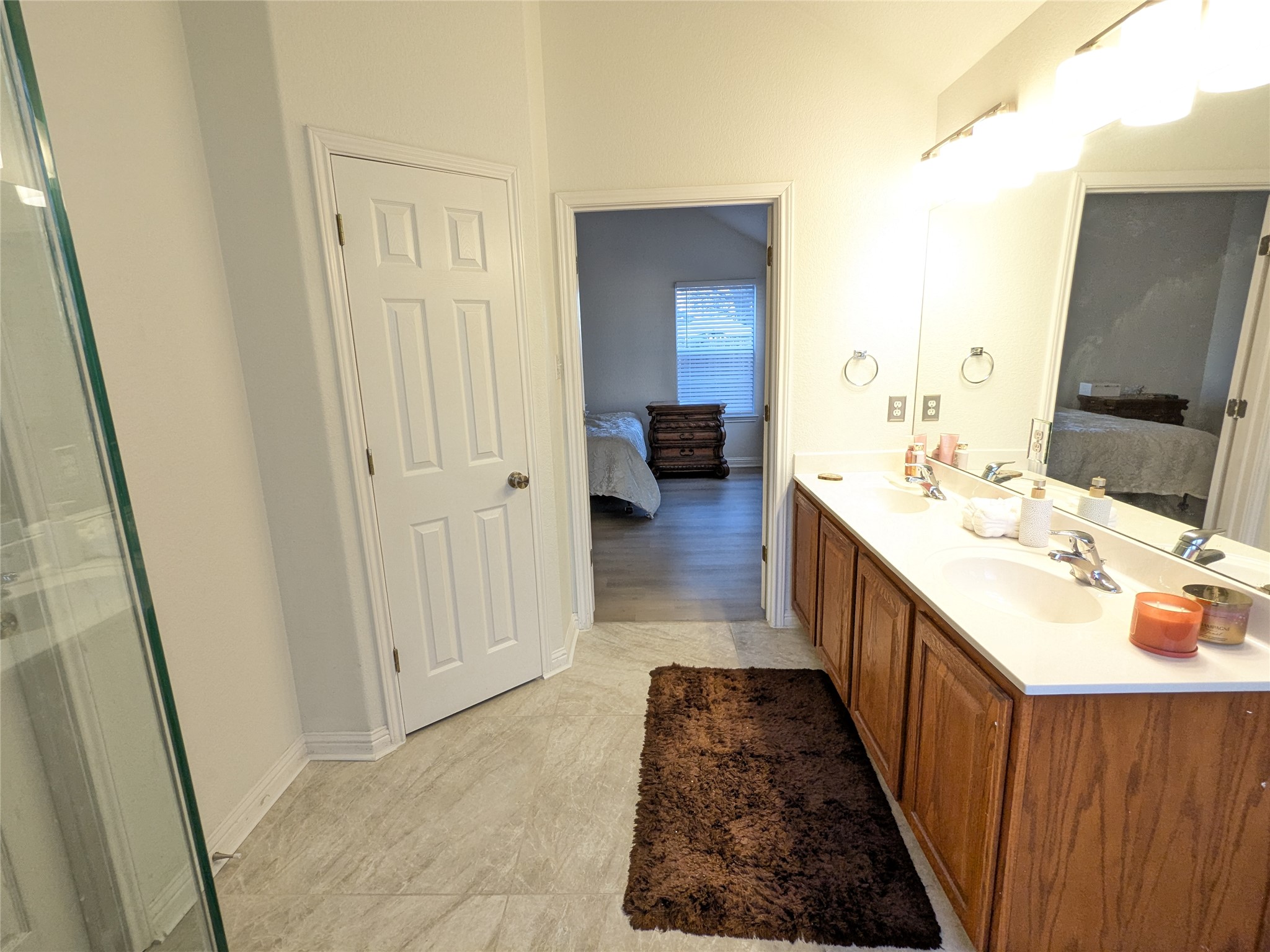 2008 Petrified Forest Drive Austin, TX 78747 - Photo 15 of 20 a bathroom with sink and mirror