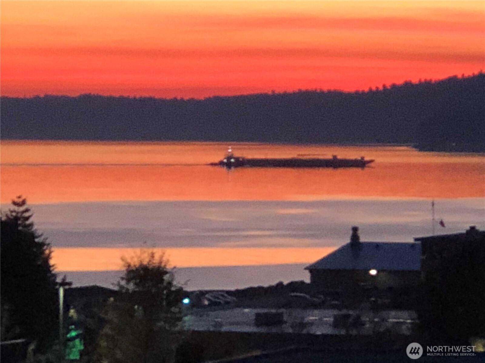 842 South 227th Place, Unit A Des Moines, WA 98198 - Photo 1 of 39 a view of sunset
