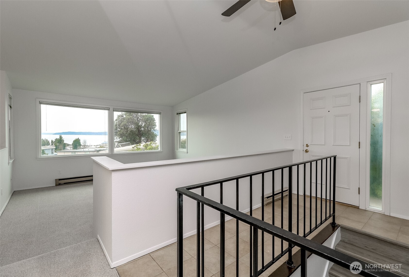 842 South 227th Place, Unit A Des Moines, WA 98198 - Photo 11 of 39 a view of hallway with furniture and a window