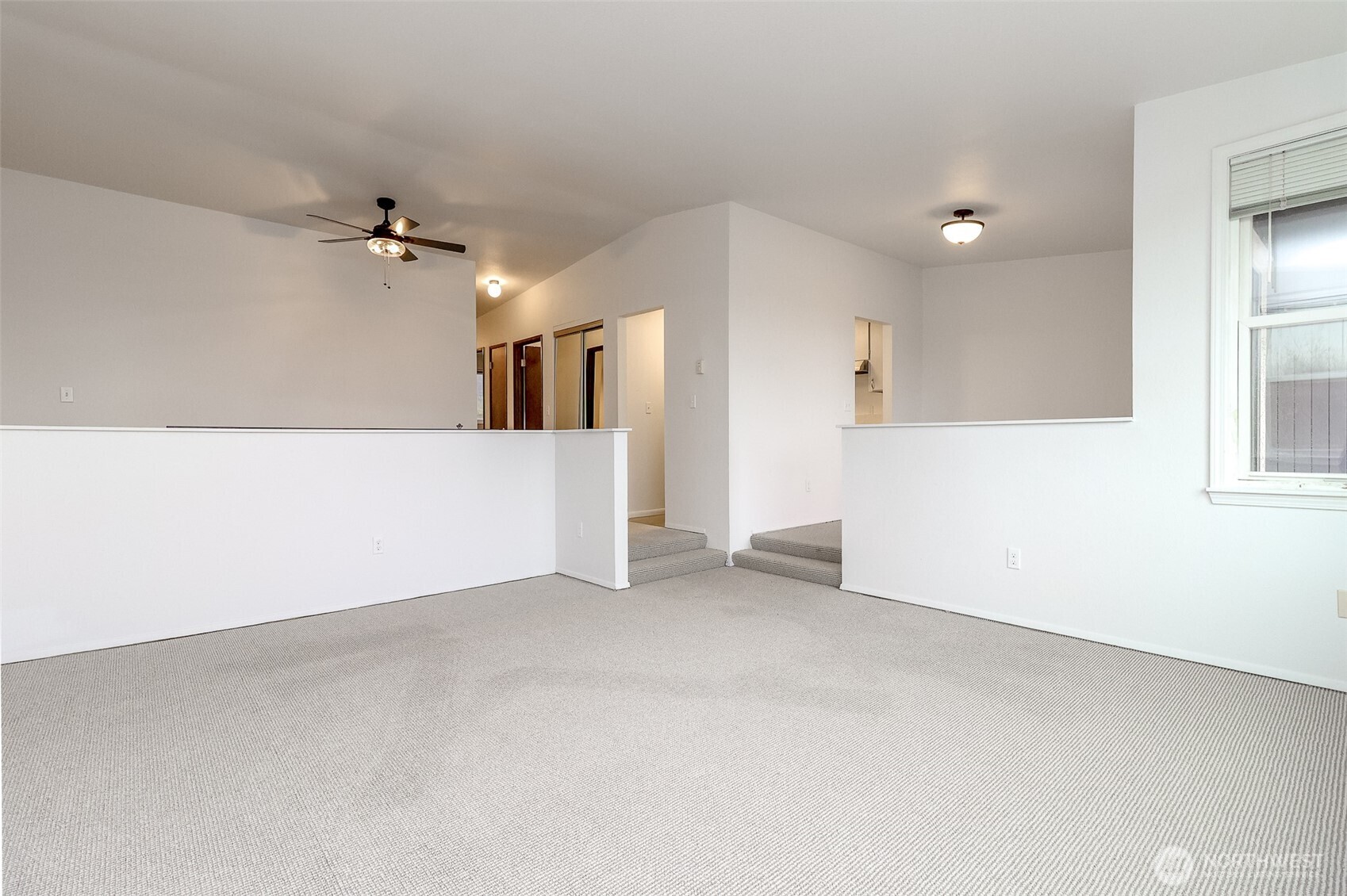 842 South 227th Place, Unit A Des Moines, WA 98198 - Photo 14 of 39 an empty room with windows