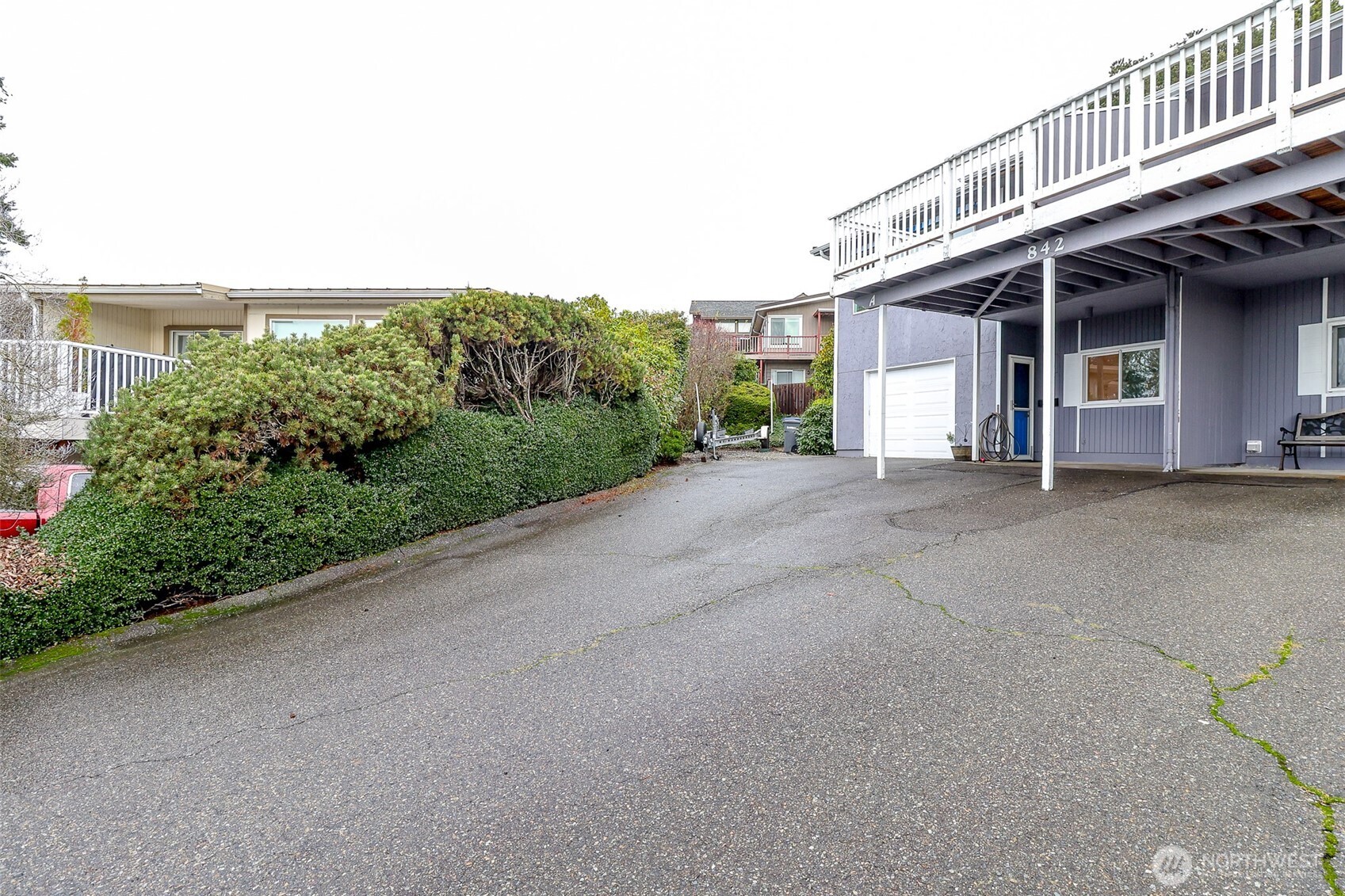 842 South 227th Place, Unit A Des Moines, WA 98198 - Photo 34 of 39 front view of a house with a street