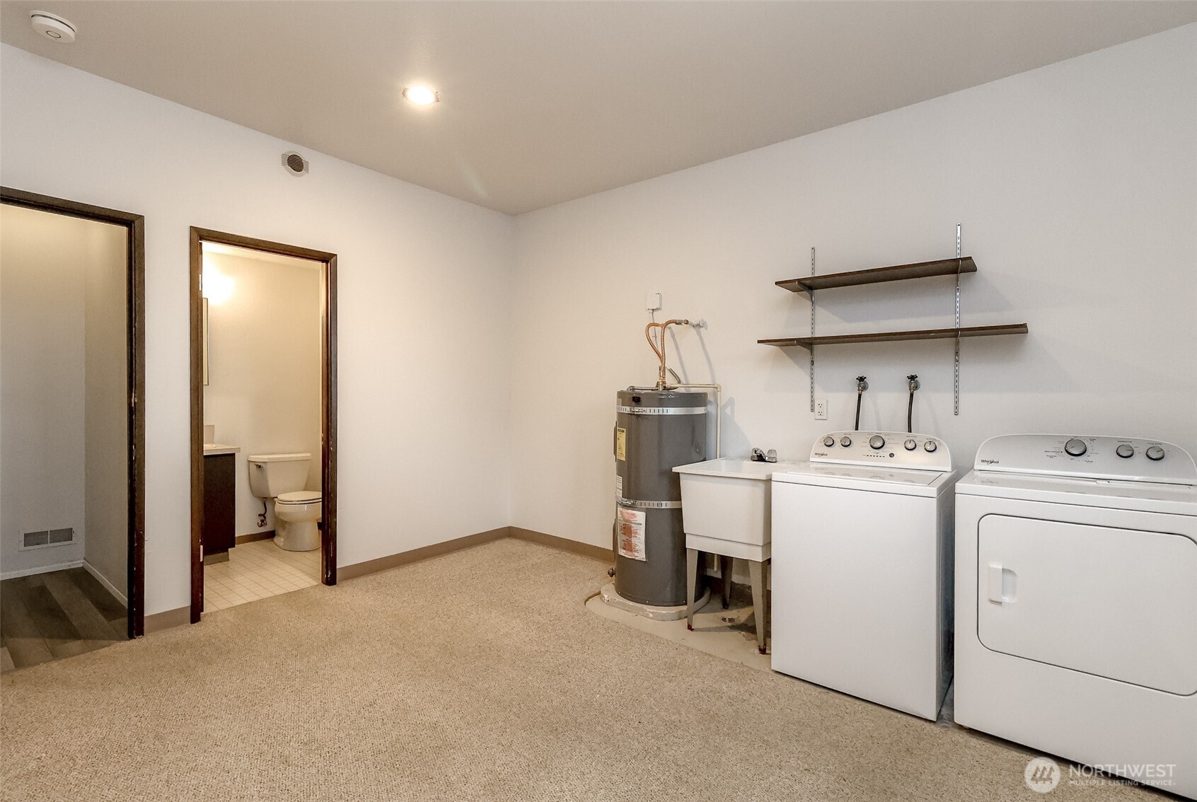 842 South 227th Place, Unit A Des Moines, WA 98198 - Photo 39 of 39 a room with storage and utility