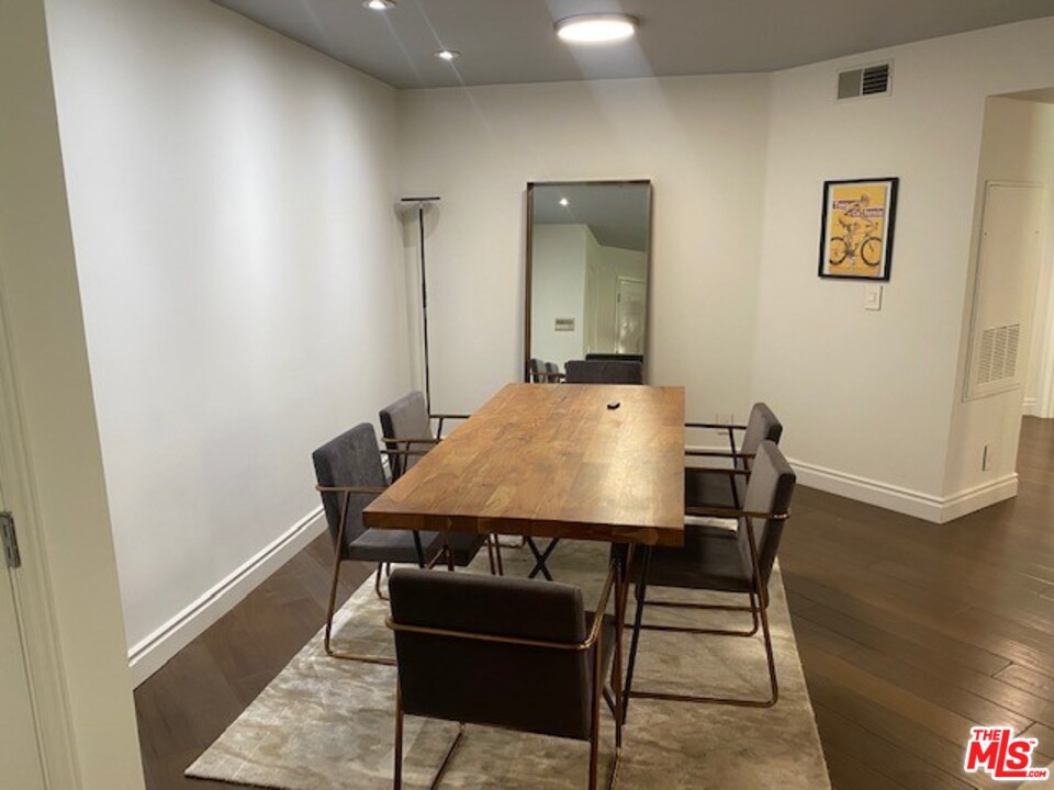 5805 Oak Bend Lane, Unit 210 Oak Park, CA 91377 - Photo 3 of 20 a view of a dining room with furniture