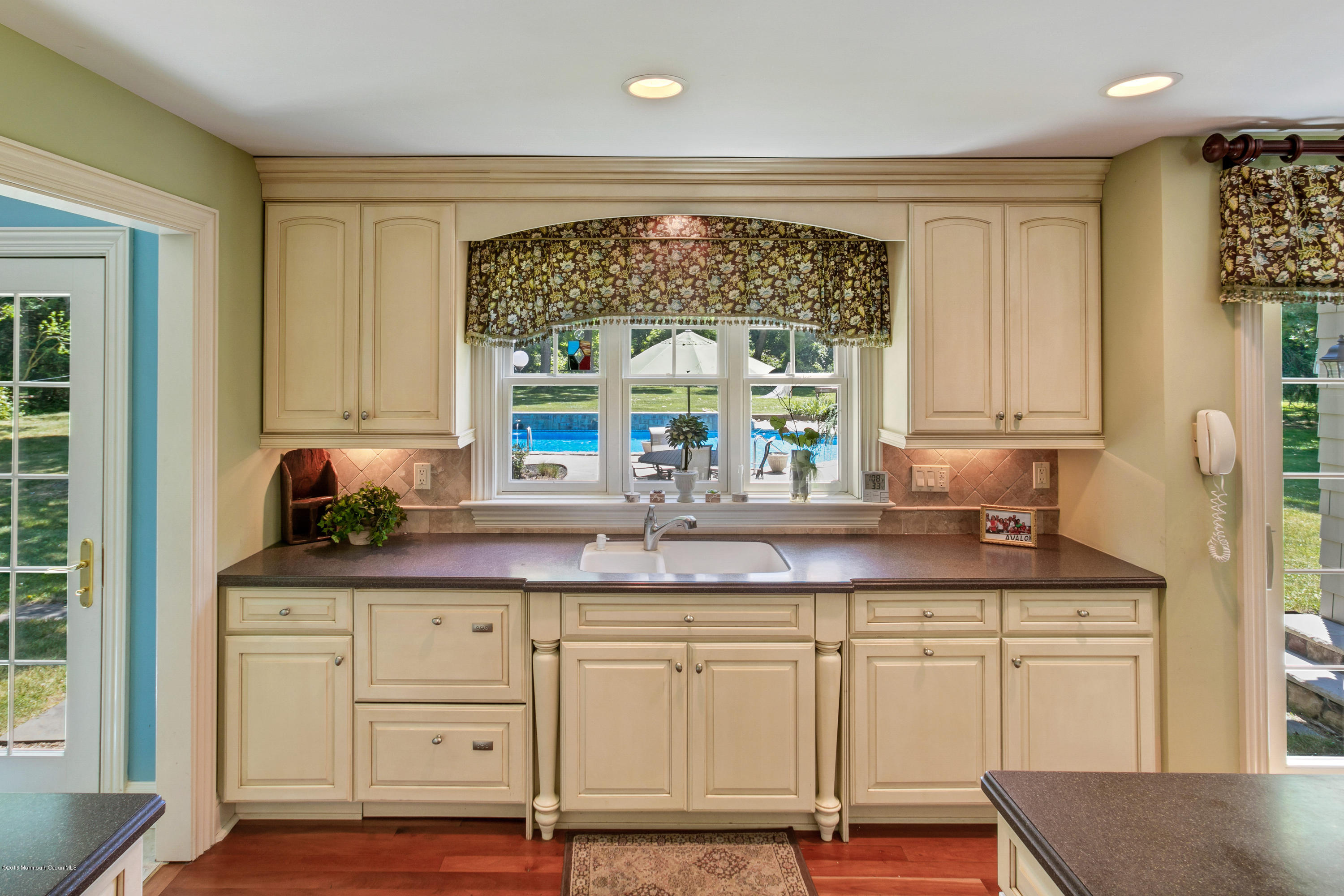 7 Partridge Way Colts Neck, NJ 07722 - Photo 14 of 50 a bath room with a sink and a mirror