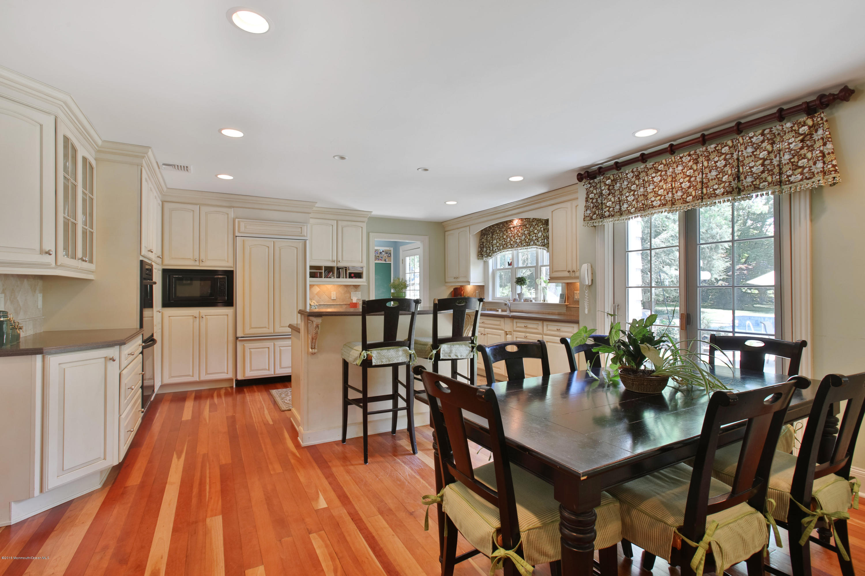 7 Partridge Way Colts Neck, NJ 07722 - Photo 15 of 50 a view of a dining room with furniture window and wooden floor