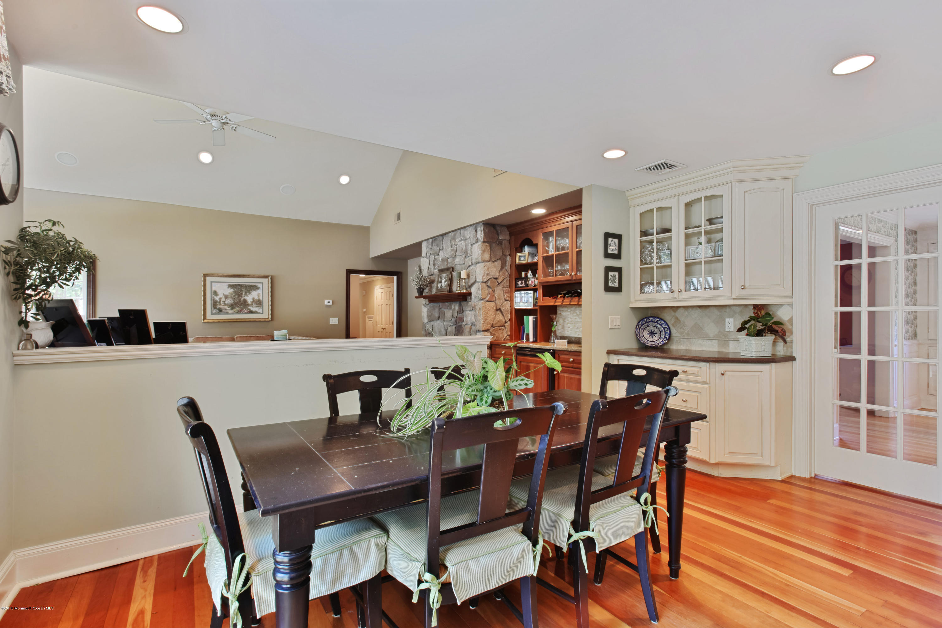 7 Partridge Way Colts Neck, NJ 07722 - Photo 18 of 50 a view of a dining room with furniture and wooden floor