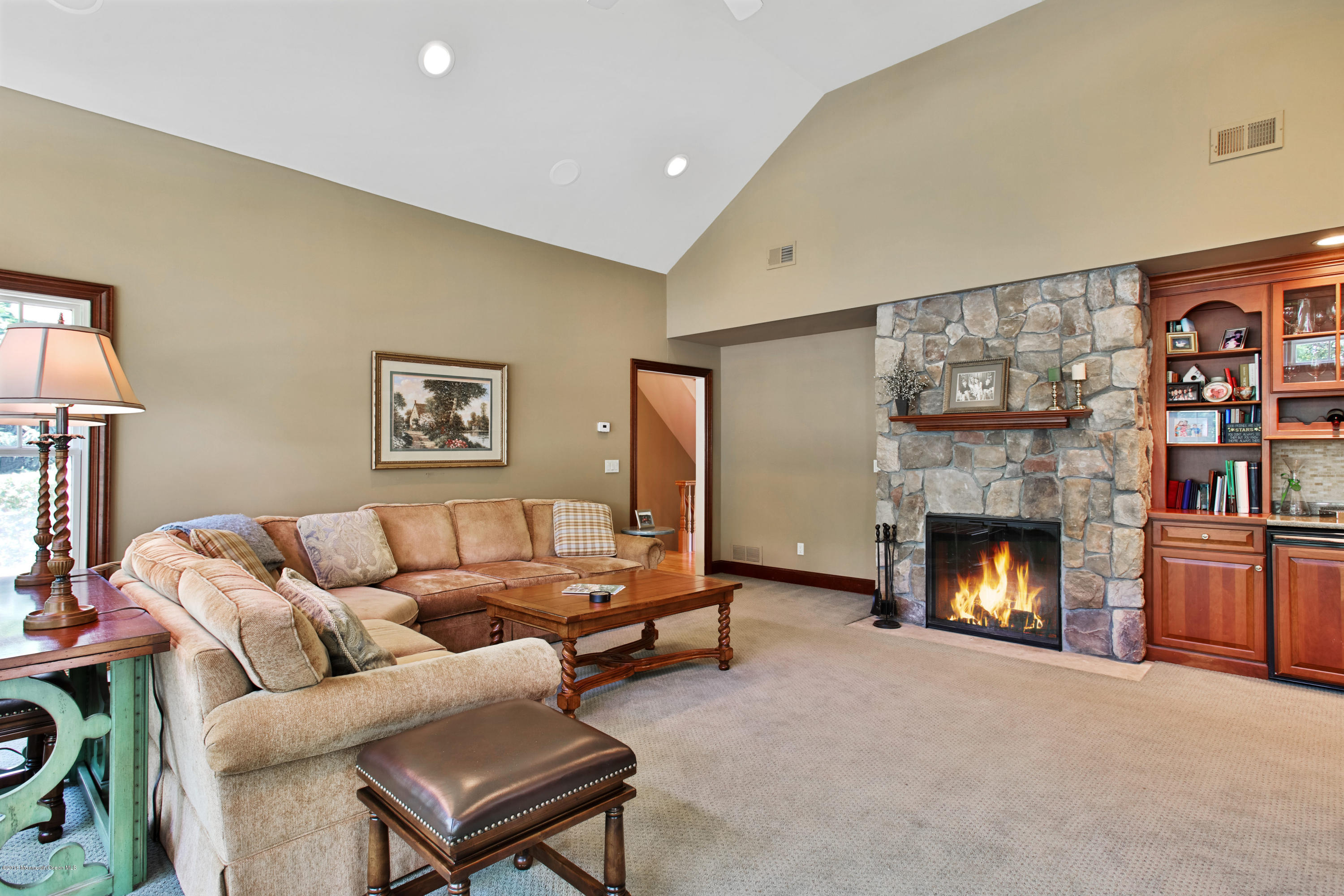 7 Partridge Way Colts Neck, NJ 07722 - Photo 22 of 50 a living room with furniture and a fireplace