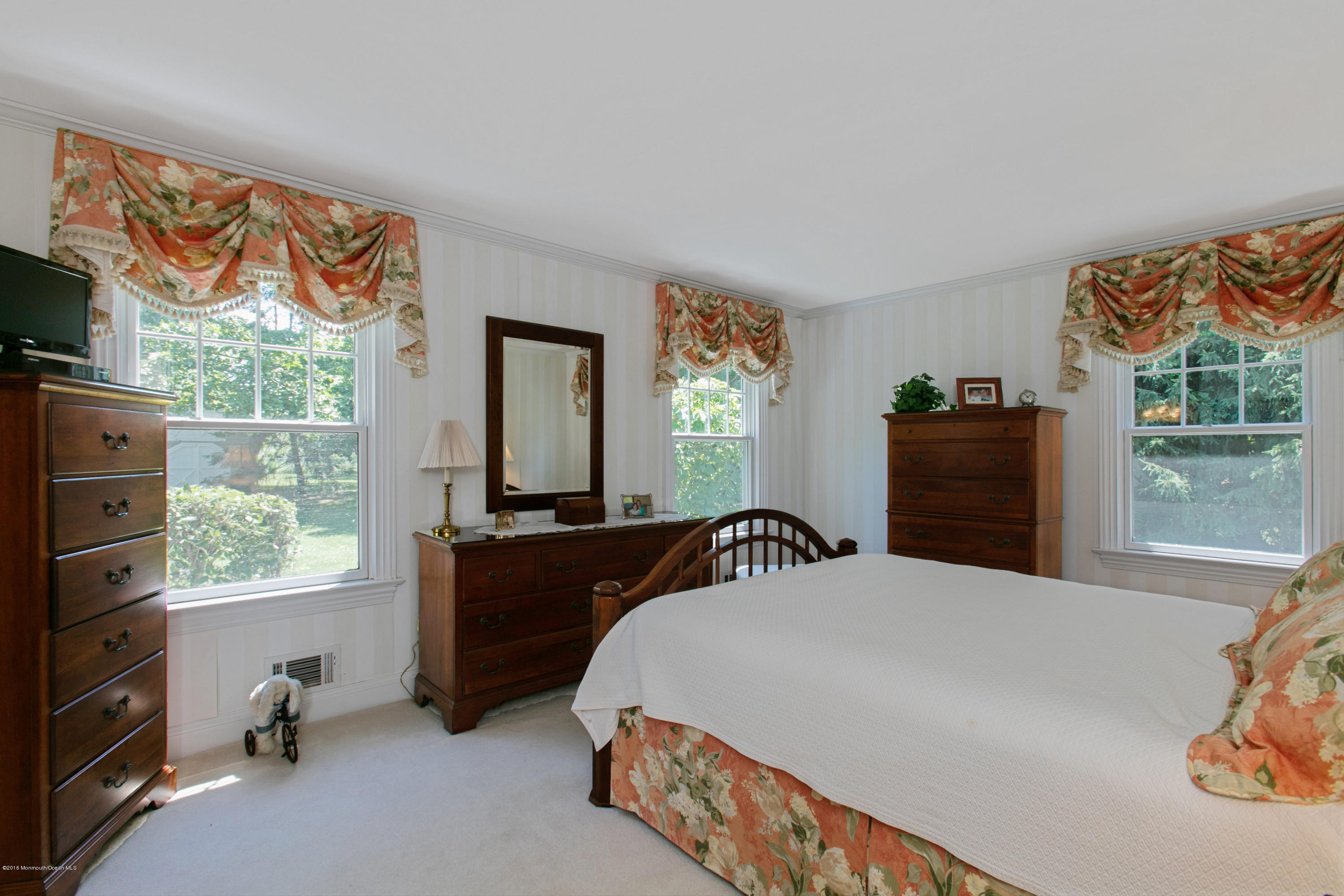 7 Partridge Way Colts Neck, NJ 07722 - Photo 26 of 50 a bedroom with a bed and a window